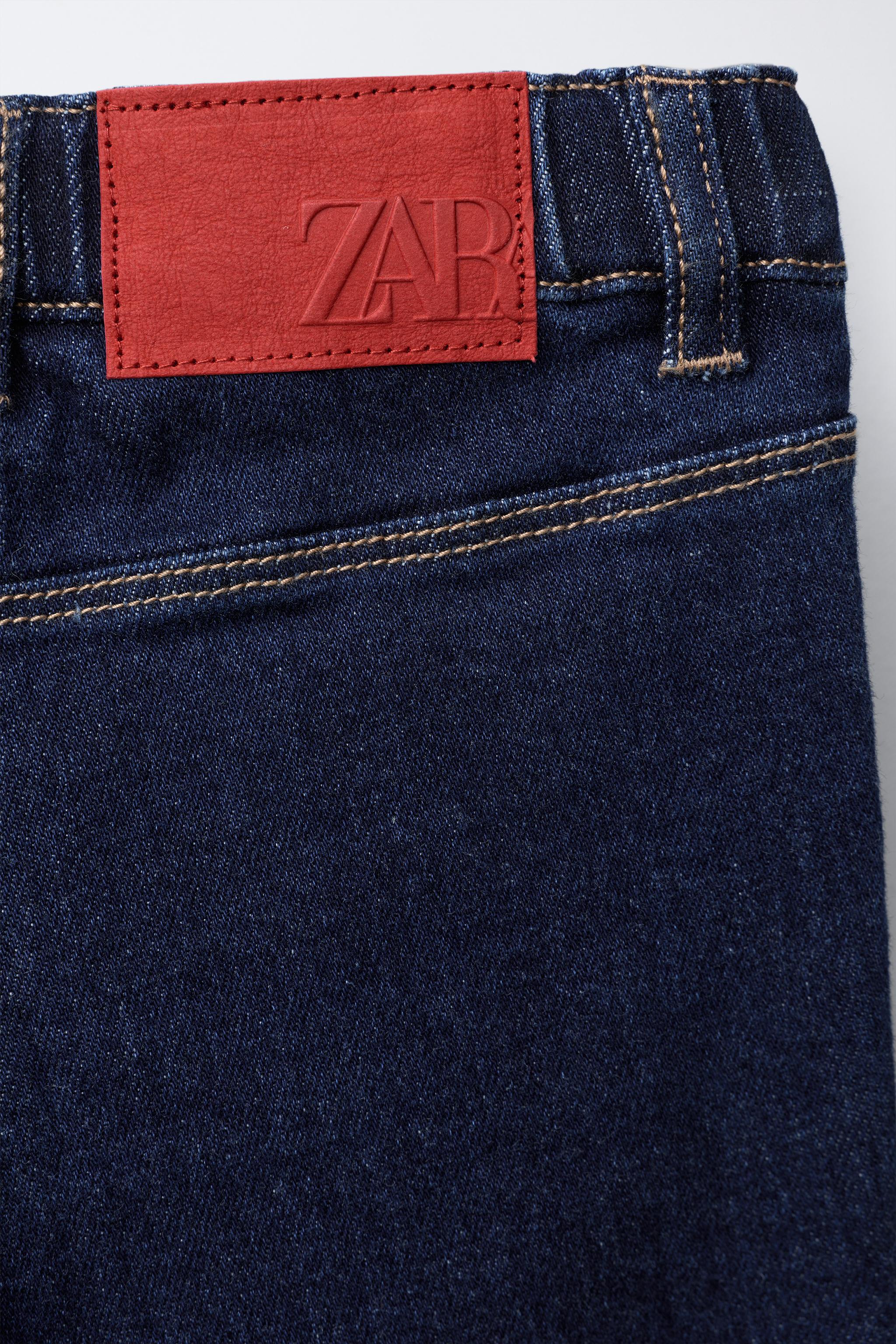 EMBROIDERED POCKET NAVY JEANS