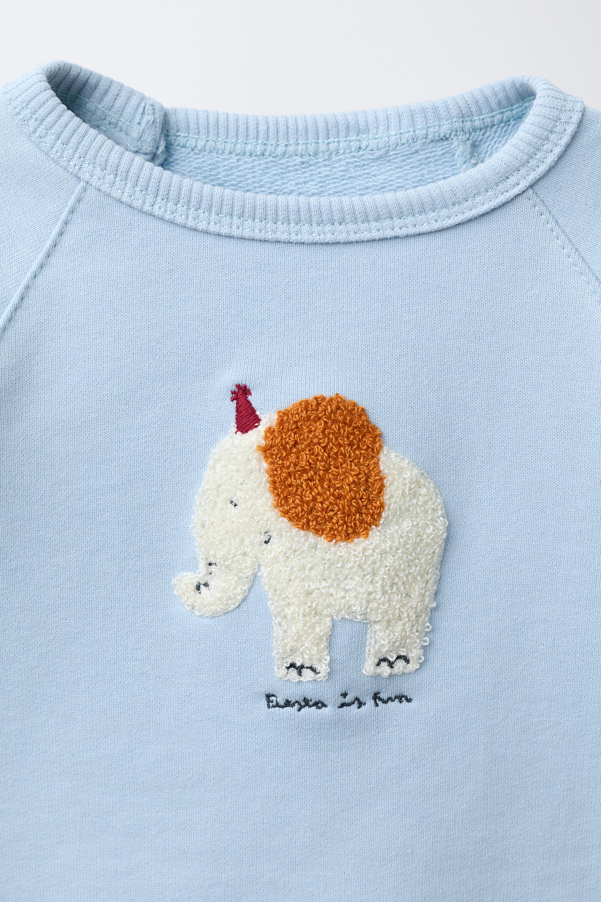 TERRY PATCH SWEATSHIRT