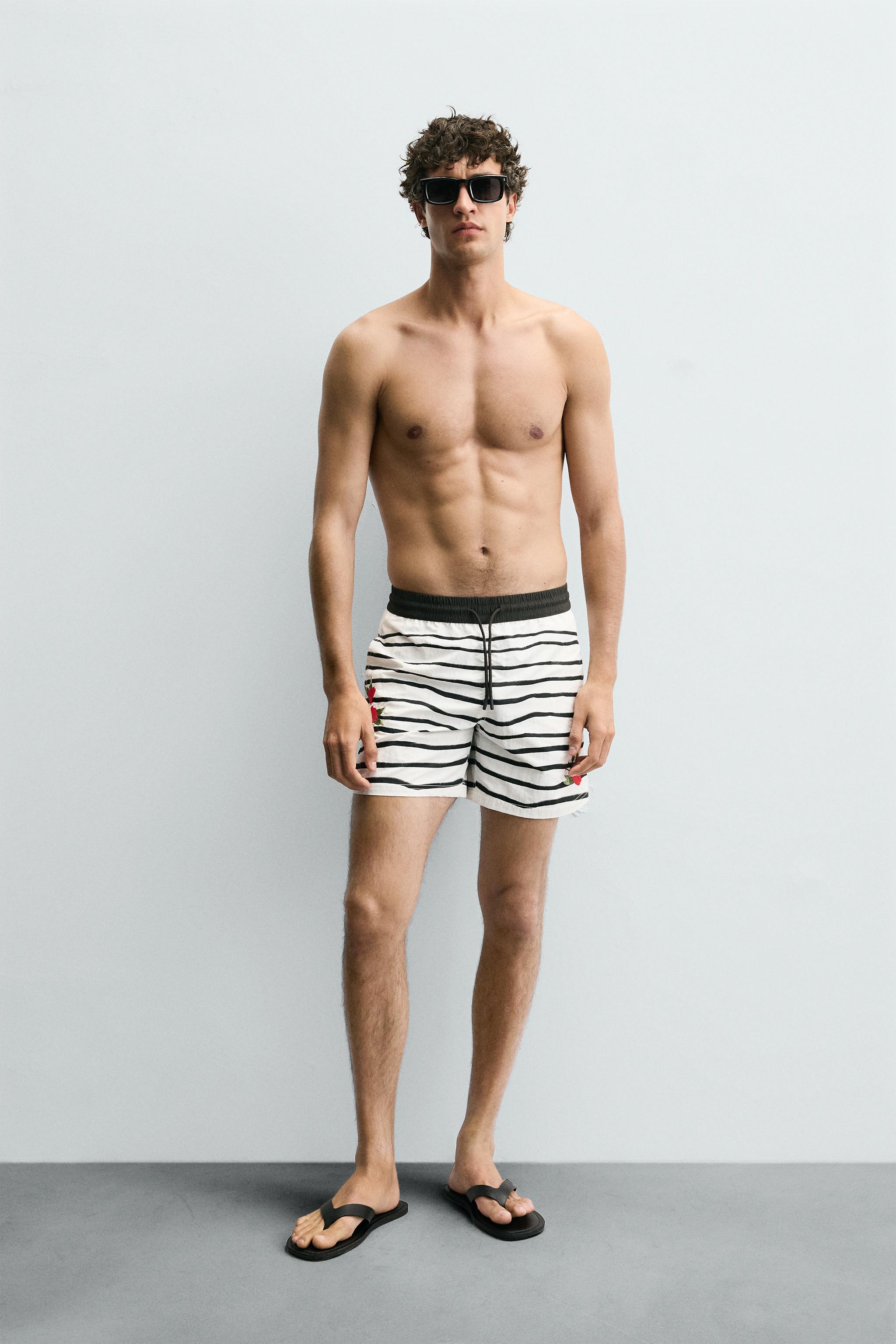 OTIS KWAME KYE QUAICOE PRINTED MID-LENGTH SWIMSUIT