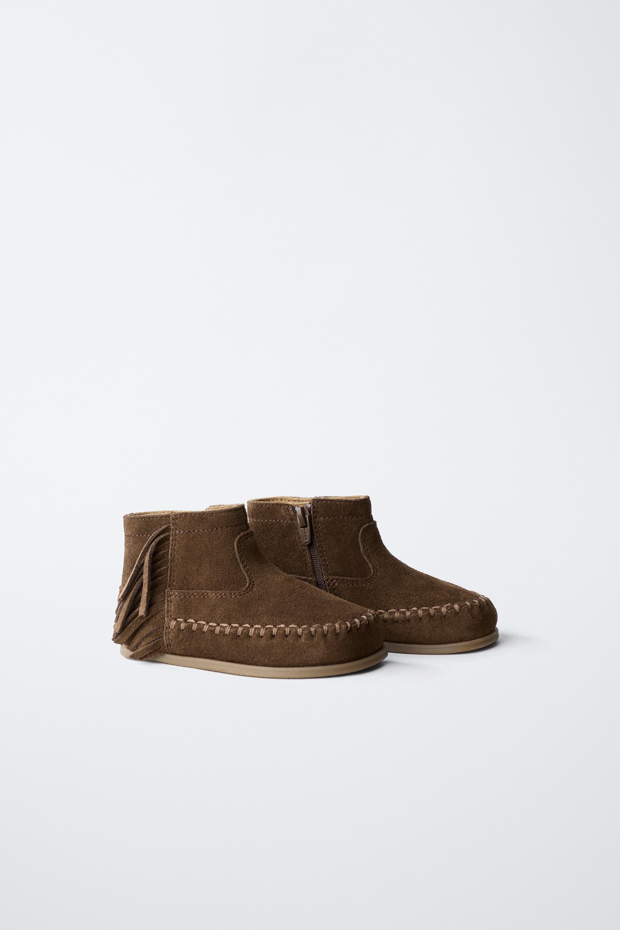 FRINGED LEATHER BOOTS