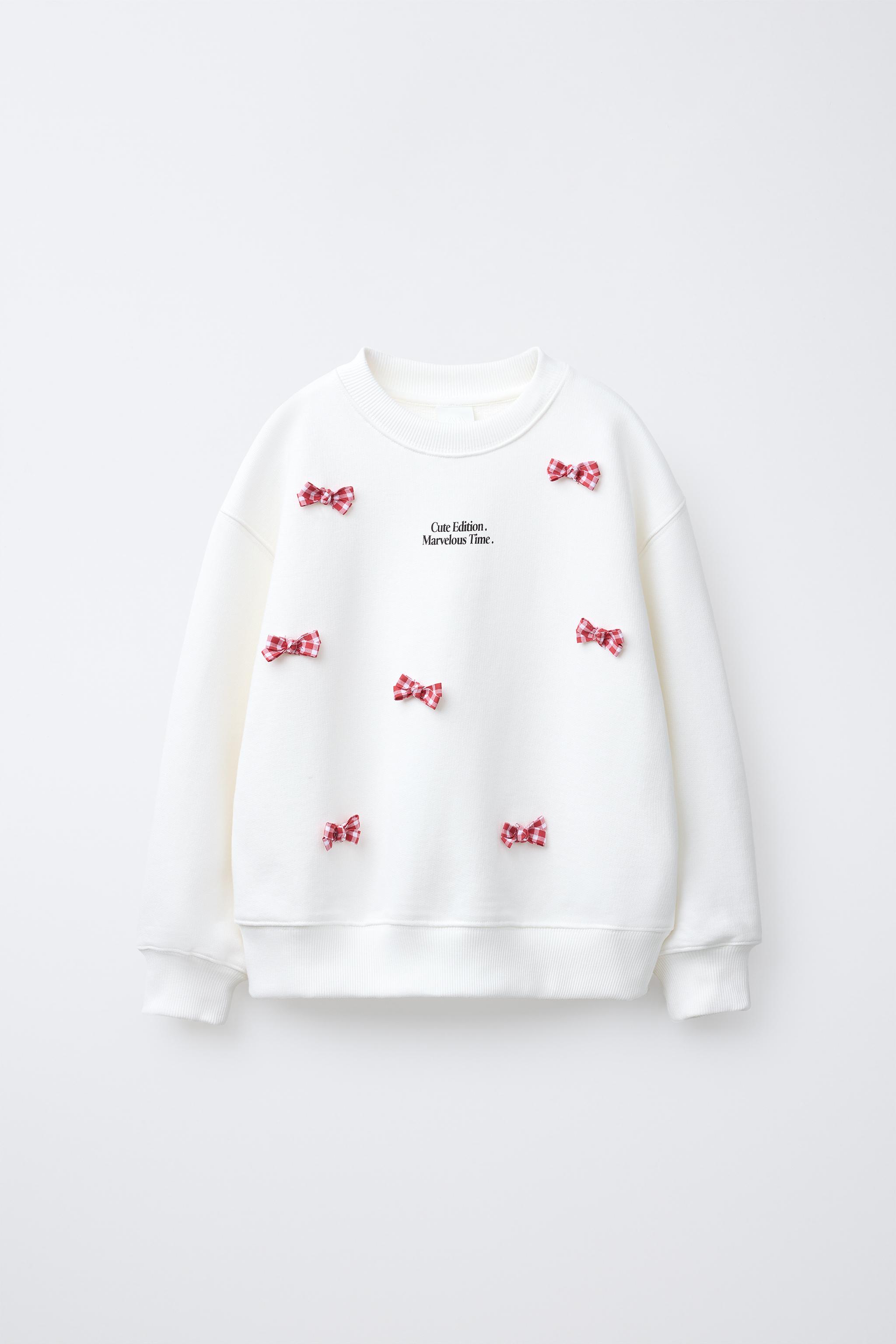TEXT AND BOWS SWEATSHIRT
