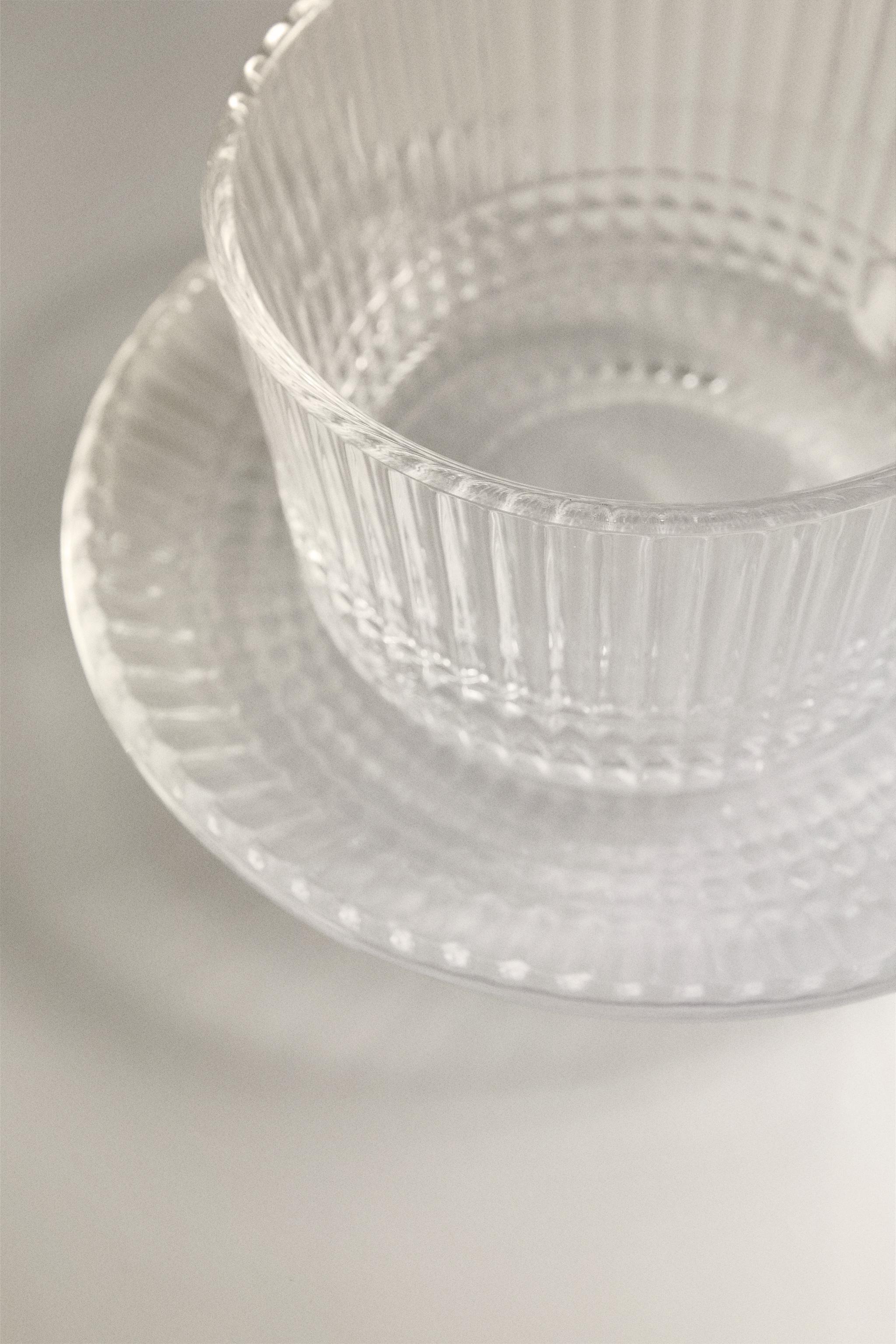 GLASS TEACUP WITH RAISED GEOMETRIC DESIGN