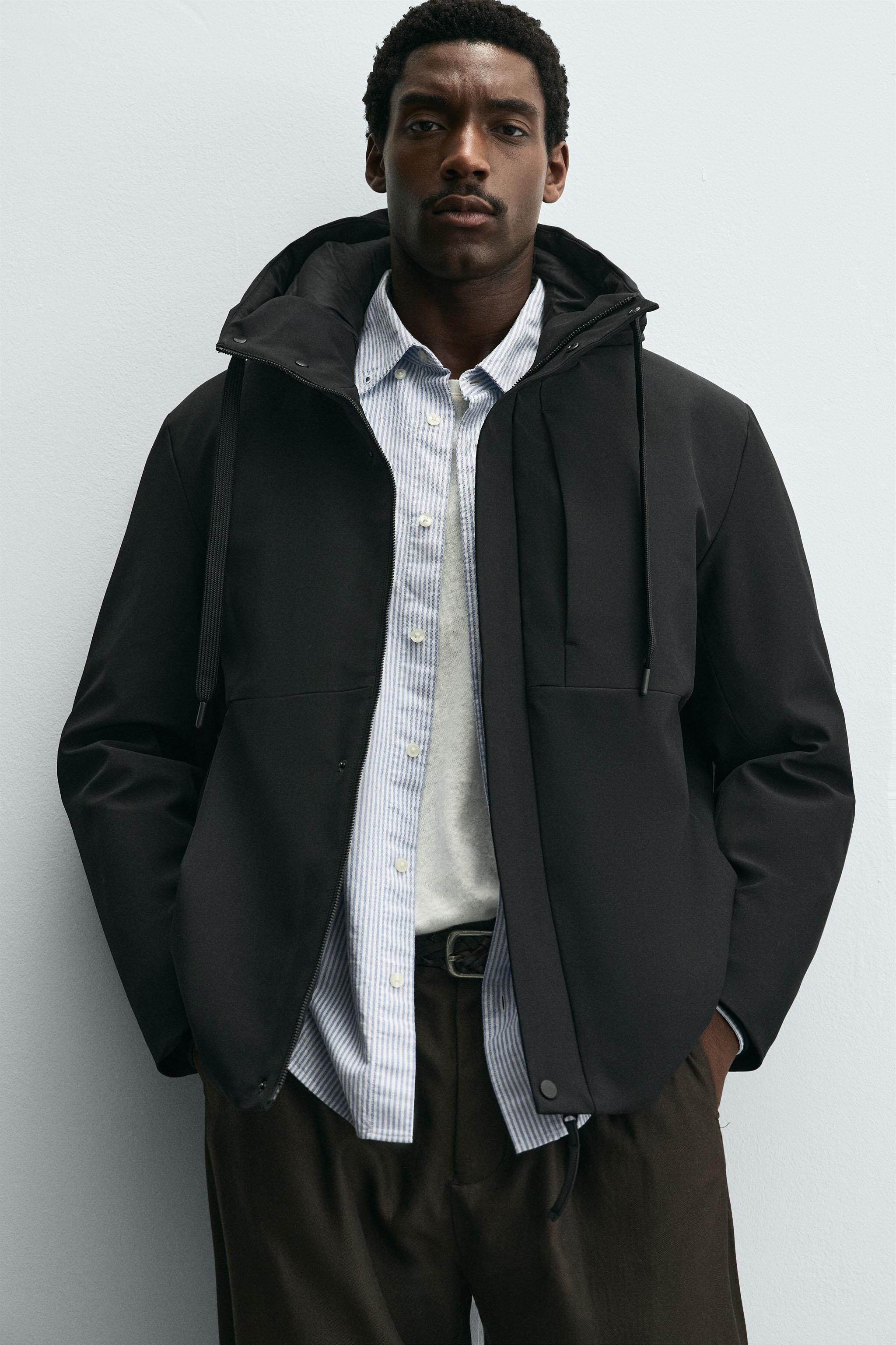 HOODED TECHNICAL JACKET