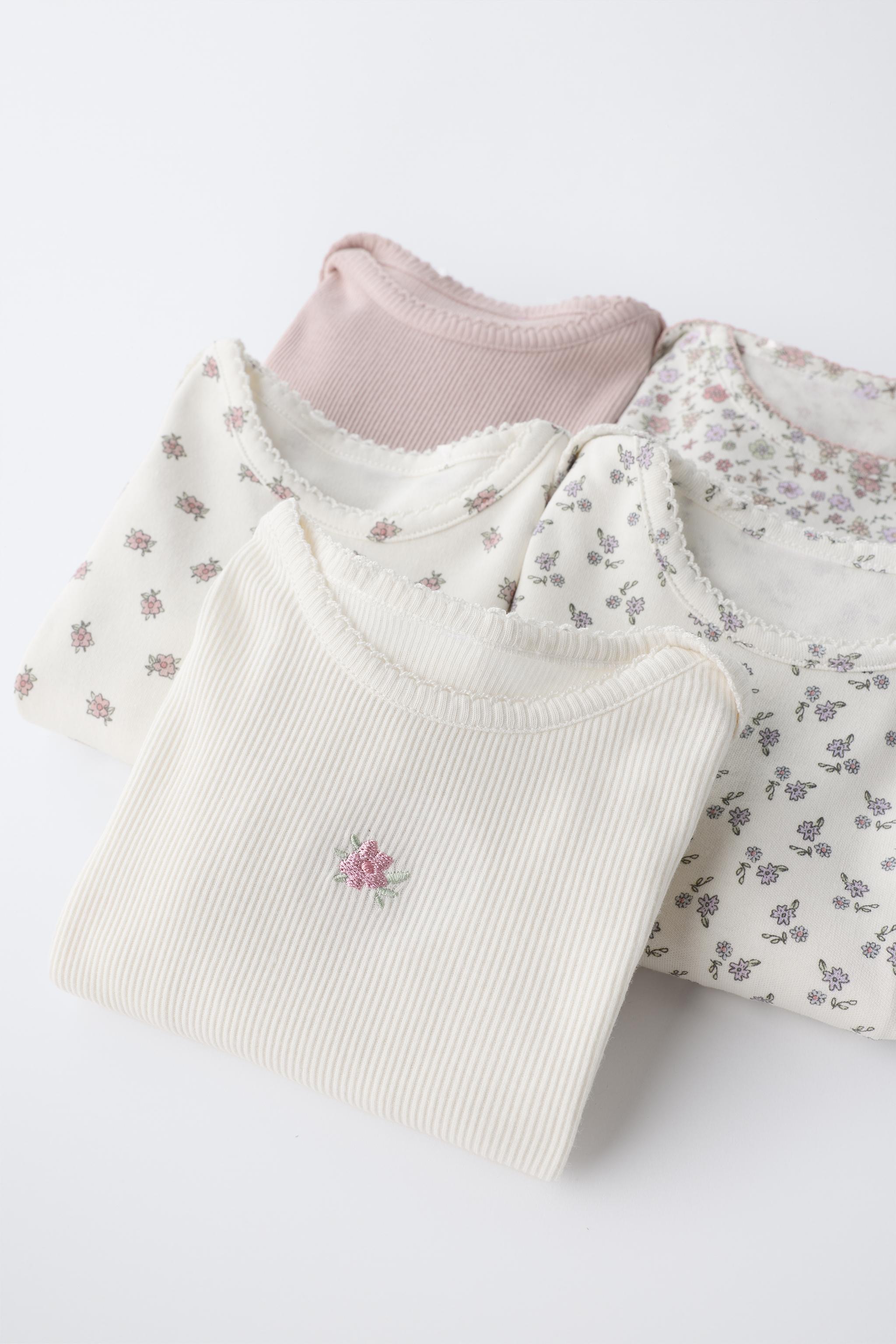 FIVE-PACK OF FLORAL BODYSUITS