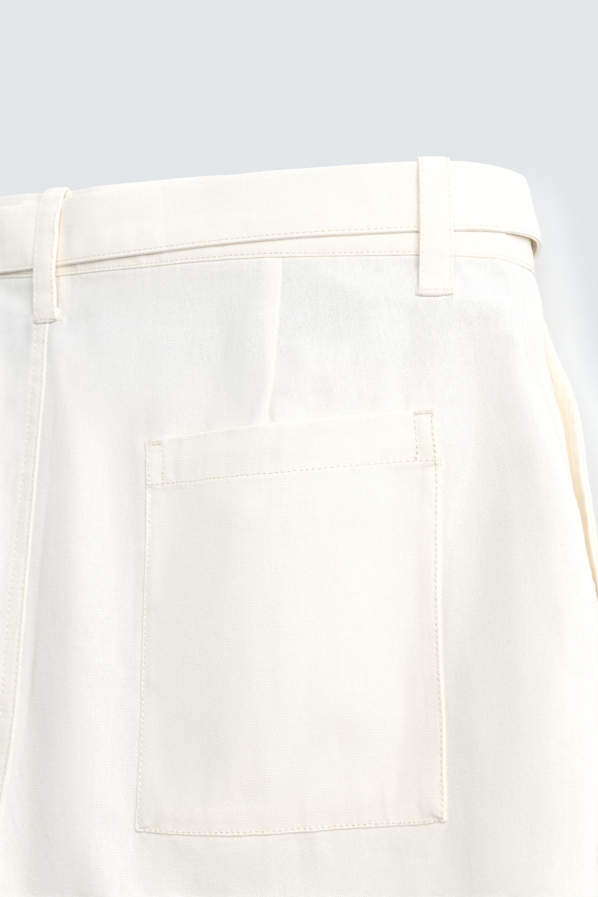 BELTED TEXTURED SHORTS