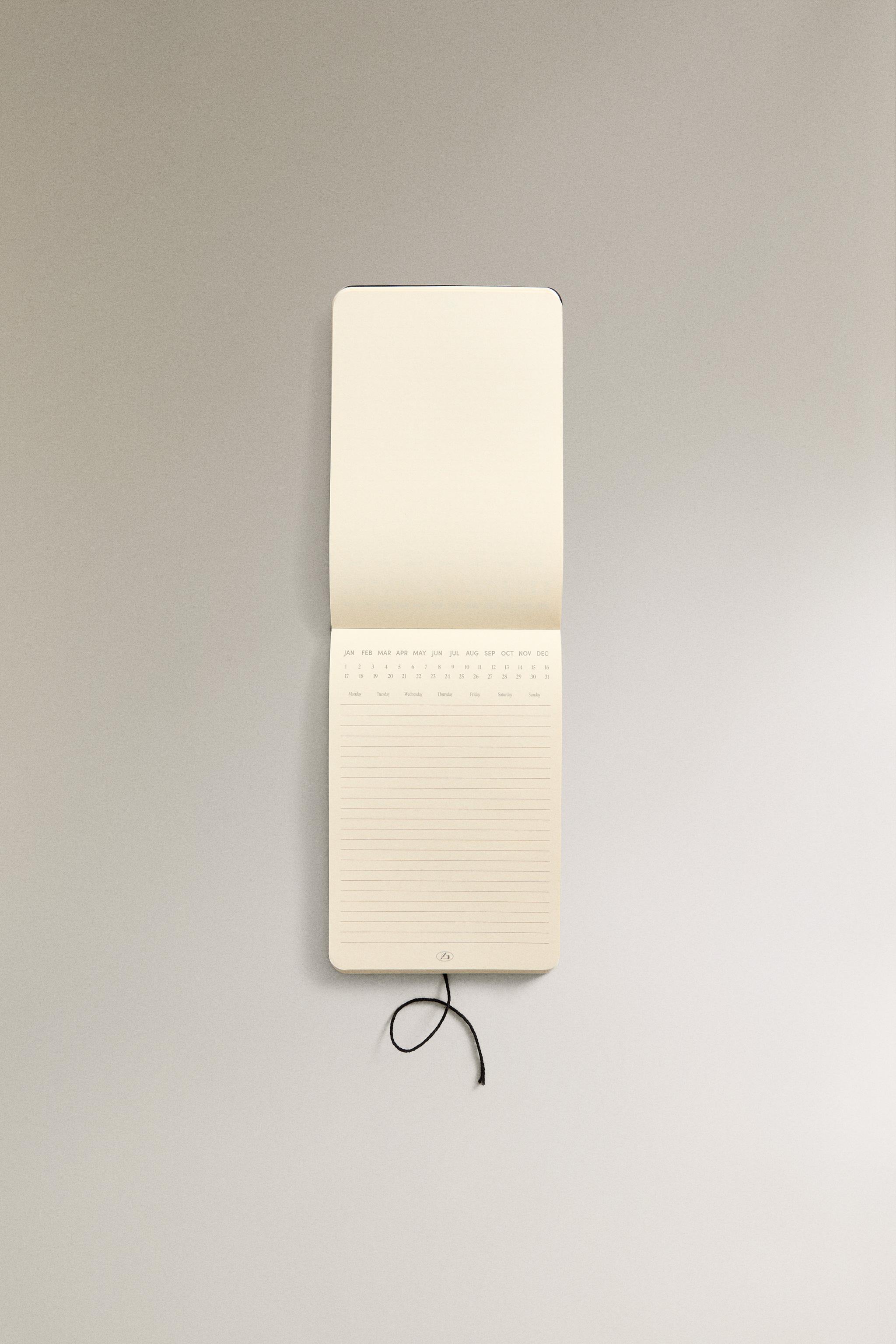 WEEKLY PLANNER WITH A CLASP