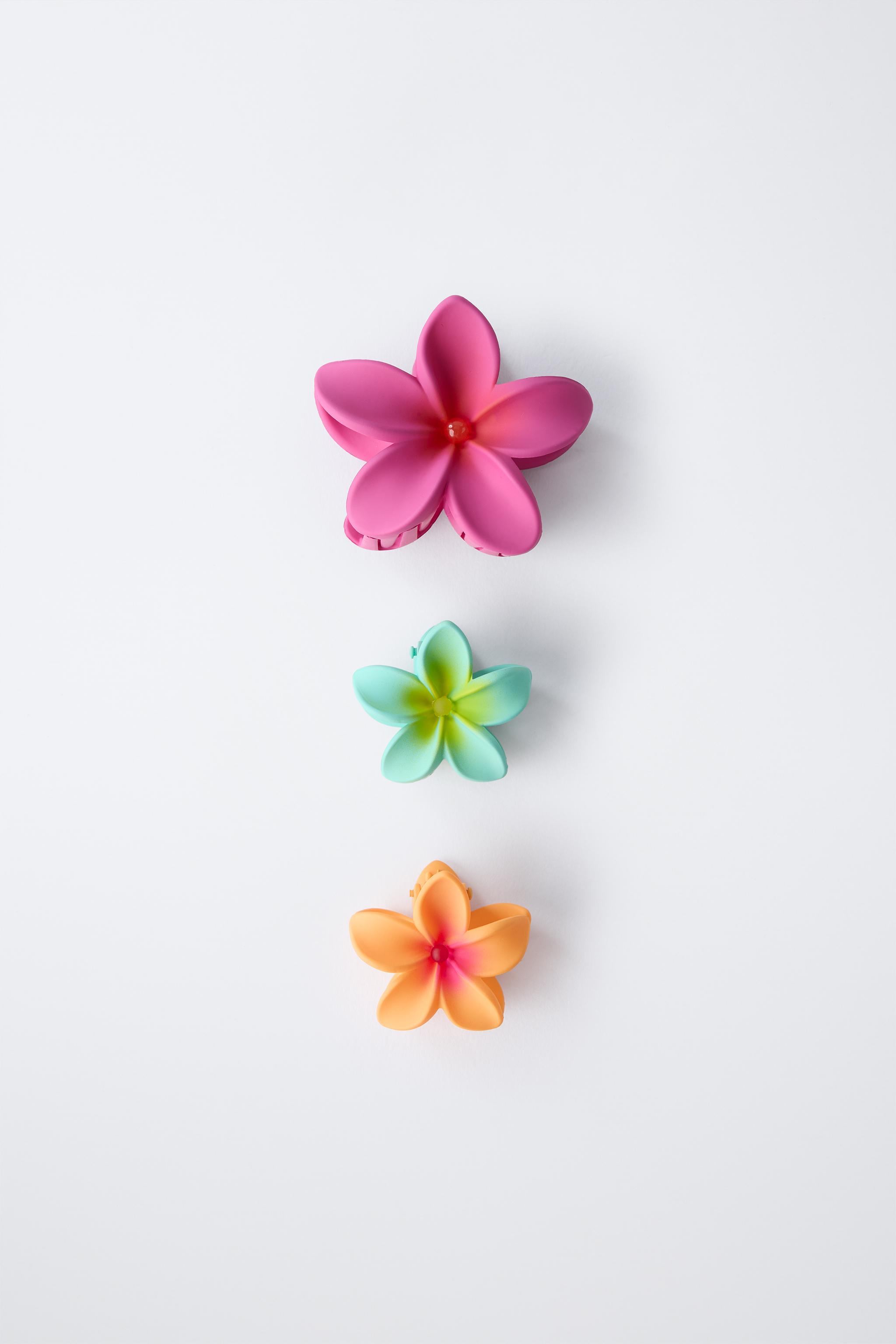 THREE PACK OF FLOWER HAIR CLIPS