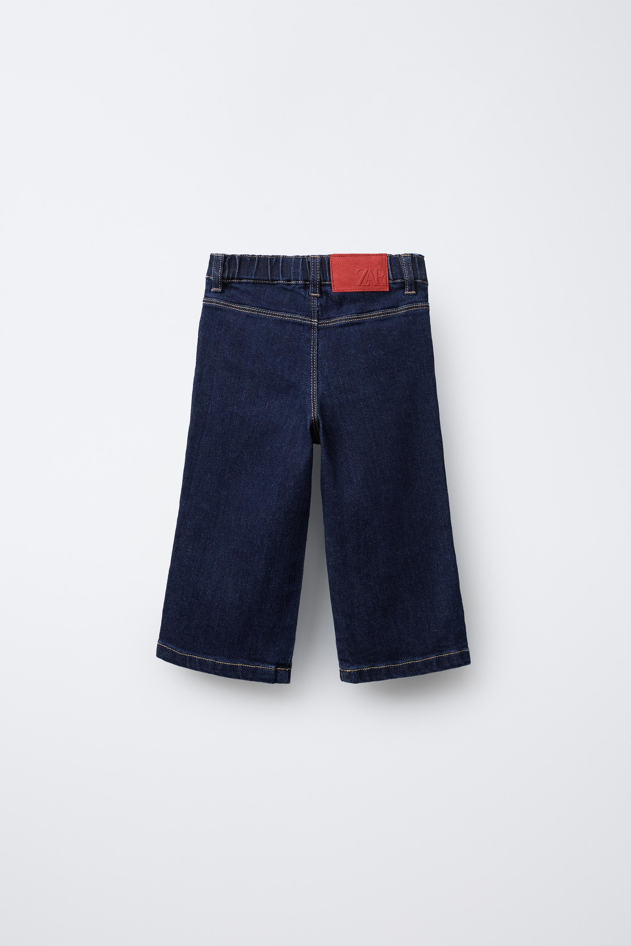 EMBROIDERED POCKET NAVY JEANS