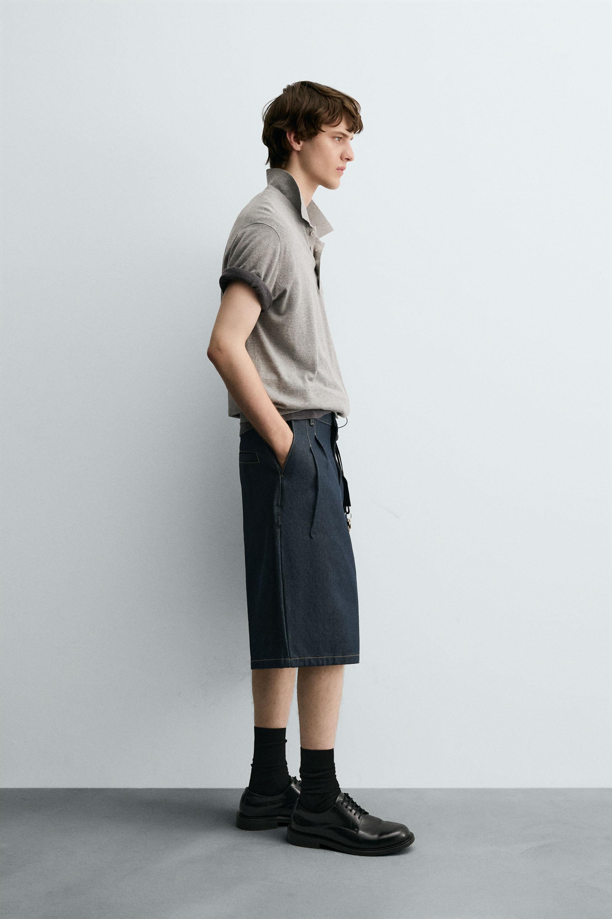 RELAXED FIT PLEATED DENIM SHORTS