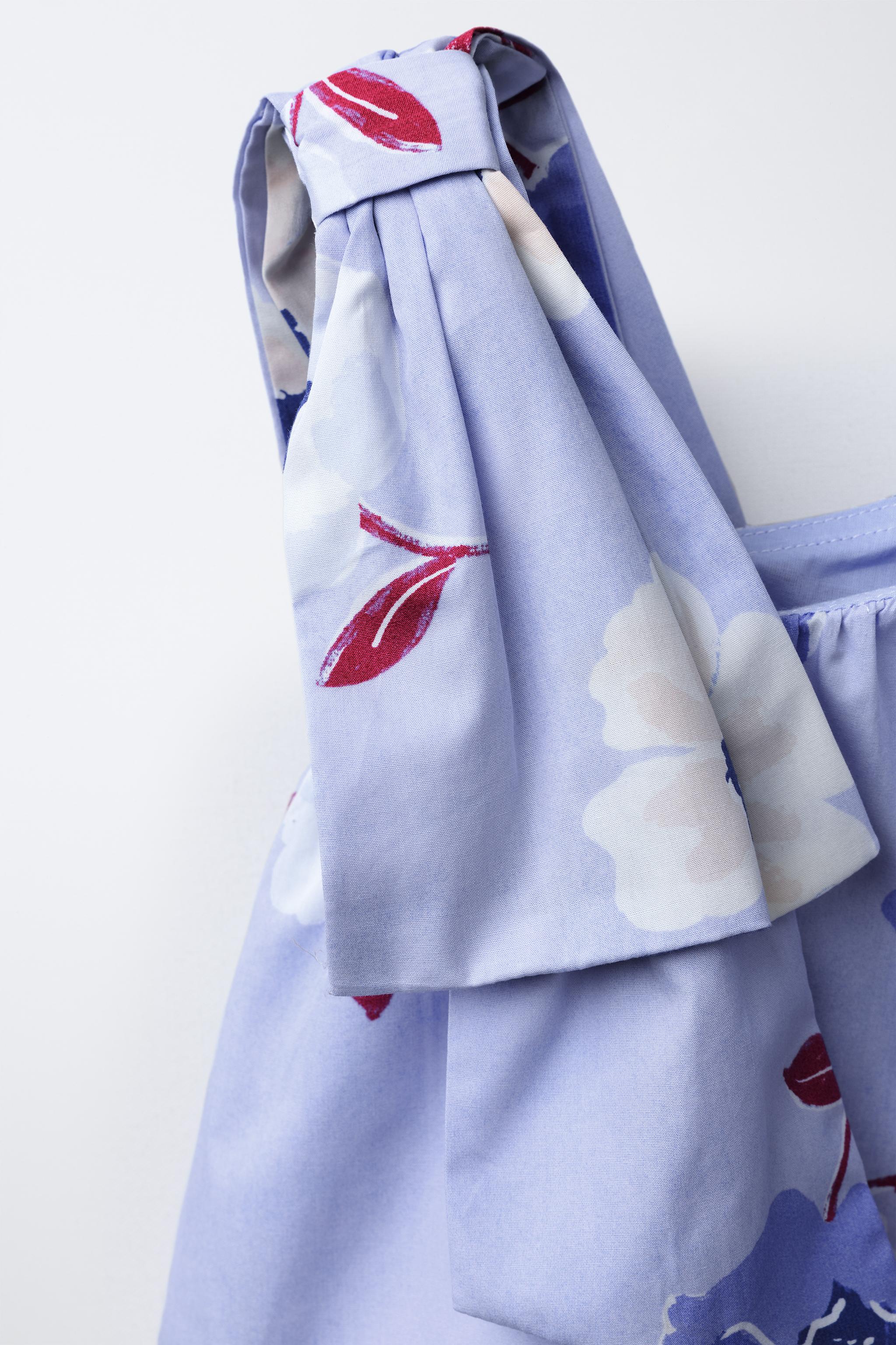 ASYMMETRIC FLORAL TOP