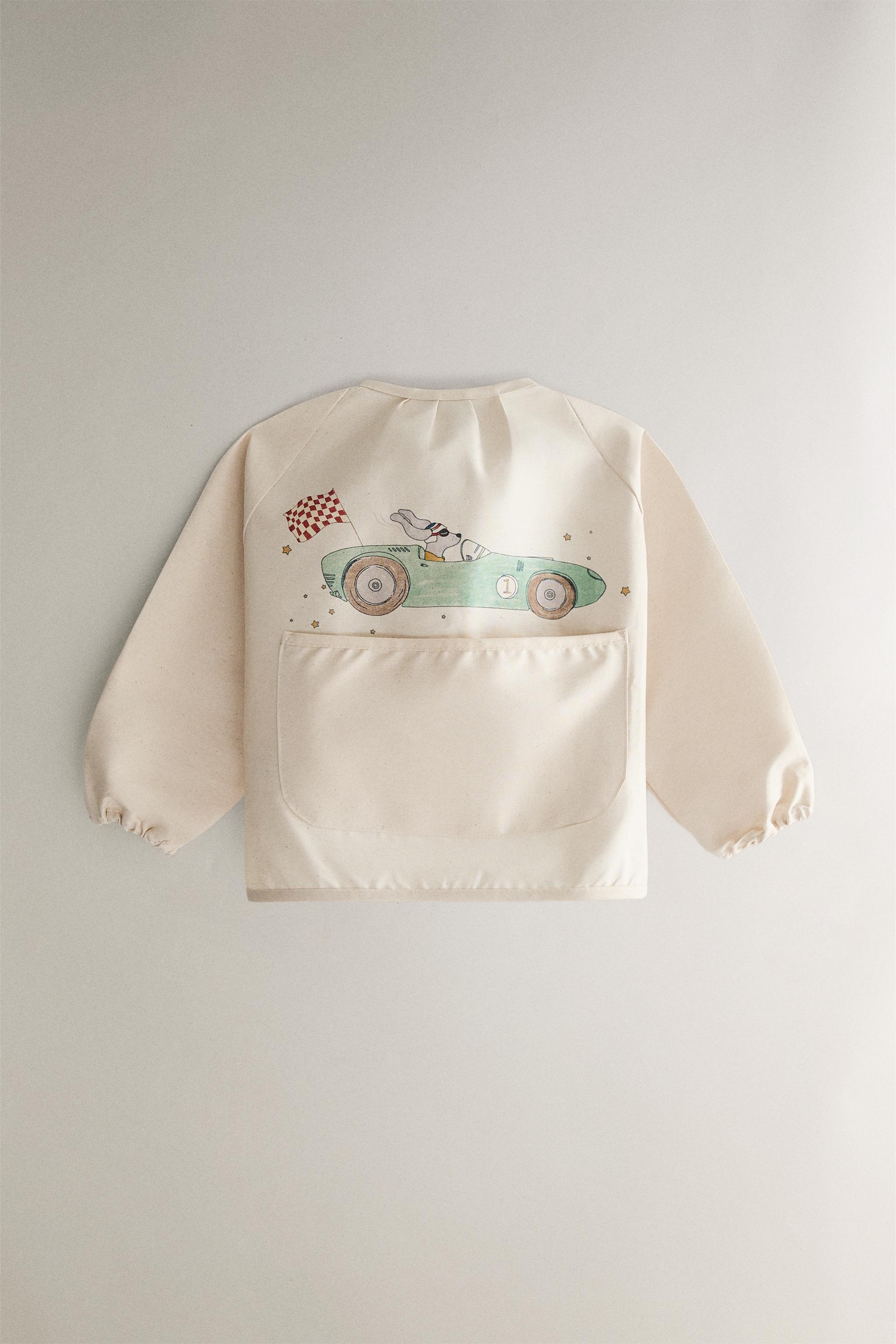 BABY BIB WITH SLEEVES AND RACING DOG