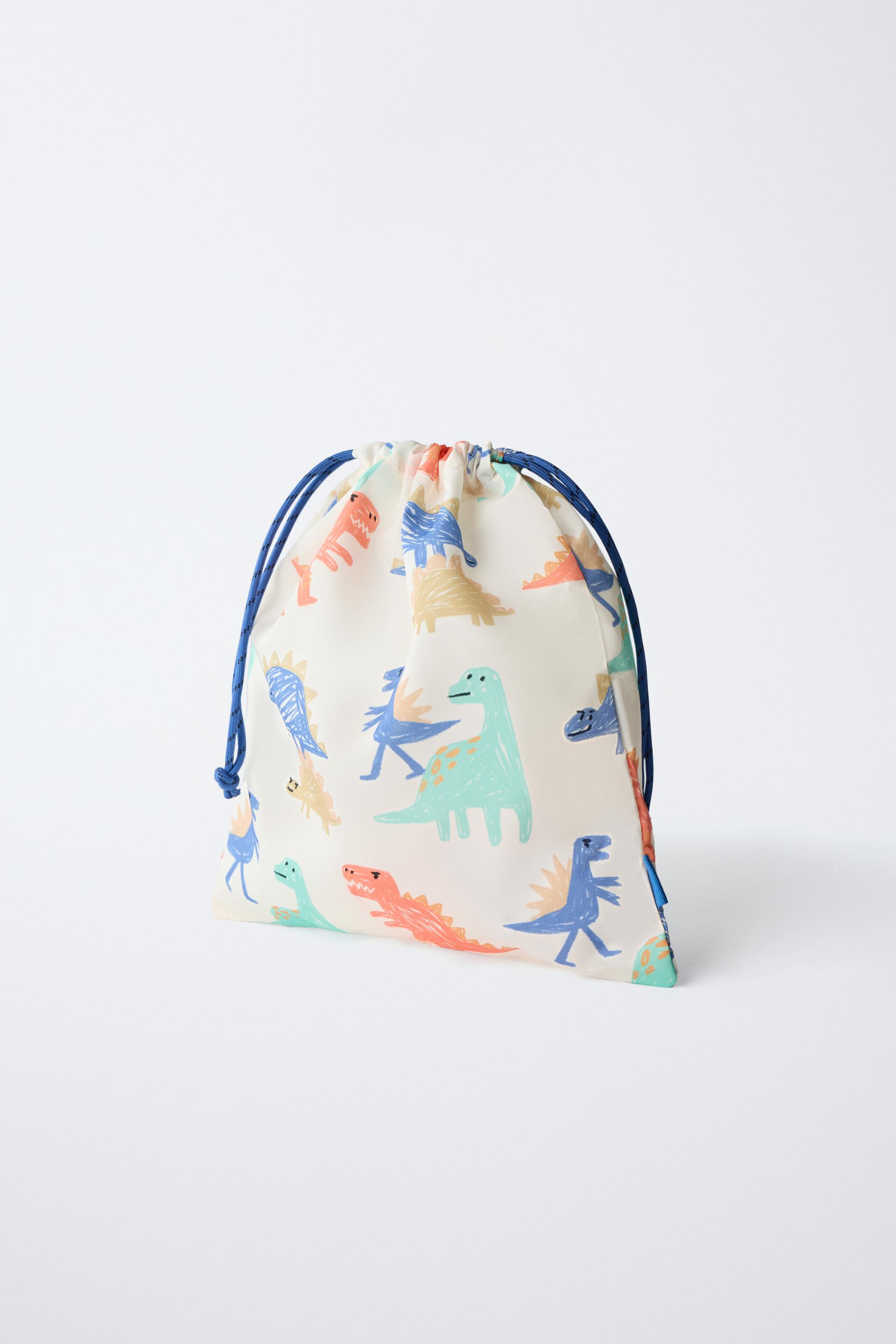 PACK OF DINOSAUR TRAVEL BAGS