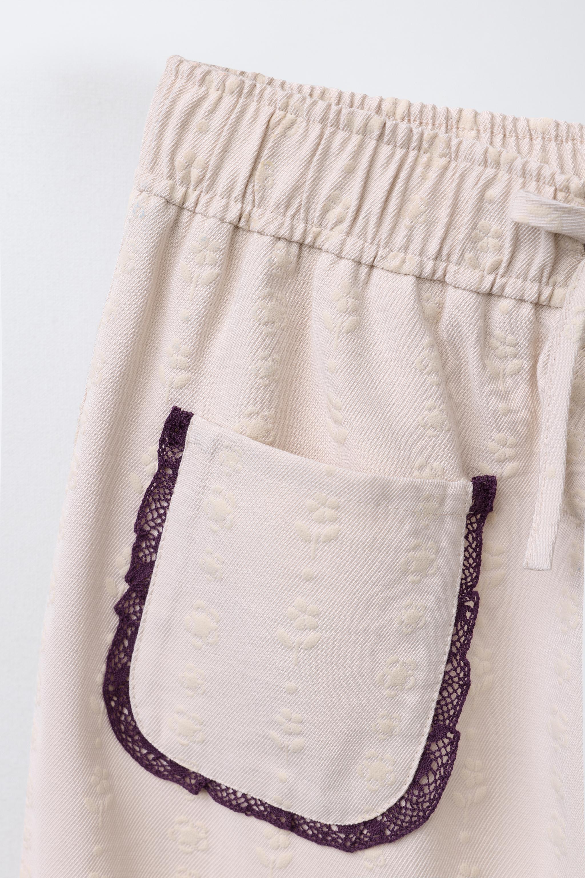 STRAIGHT LEG FLORAL PANTS WITH LACE TRIM