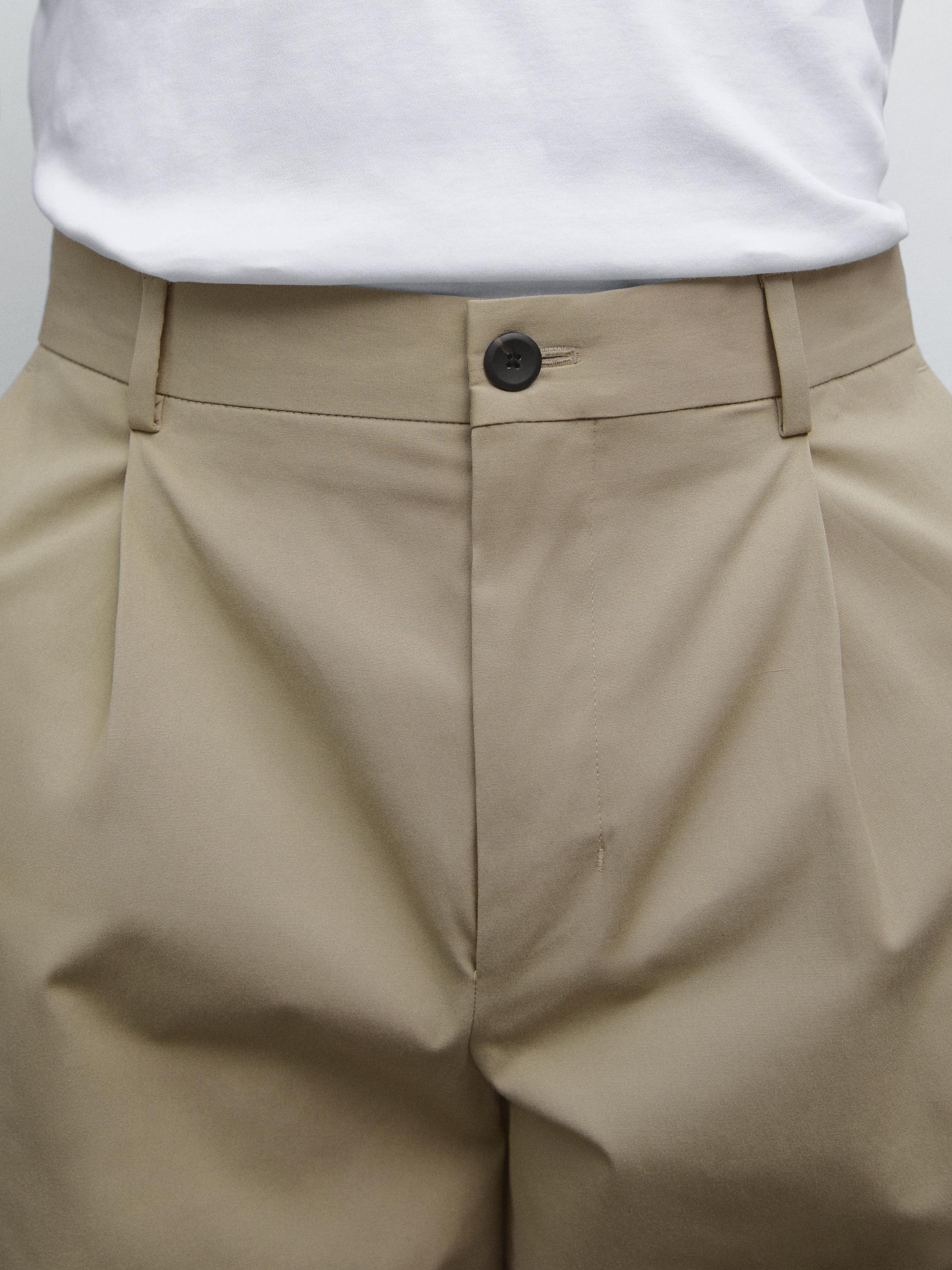 Relaxed-fit trousers with dart detail