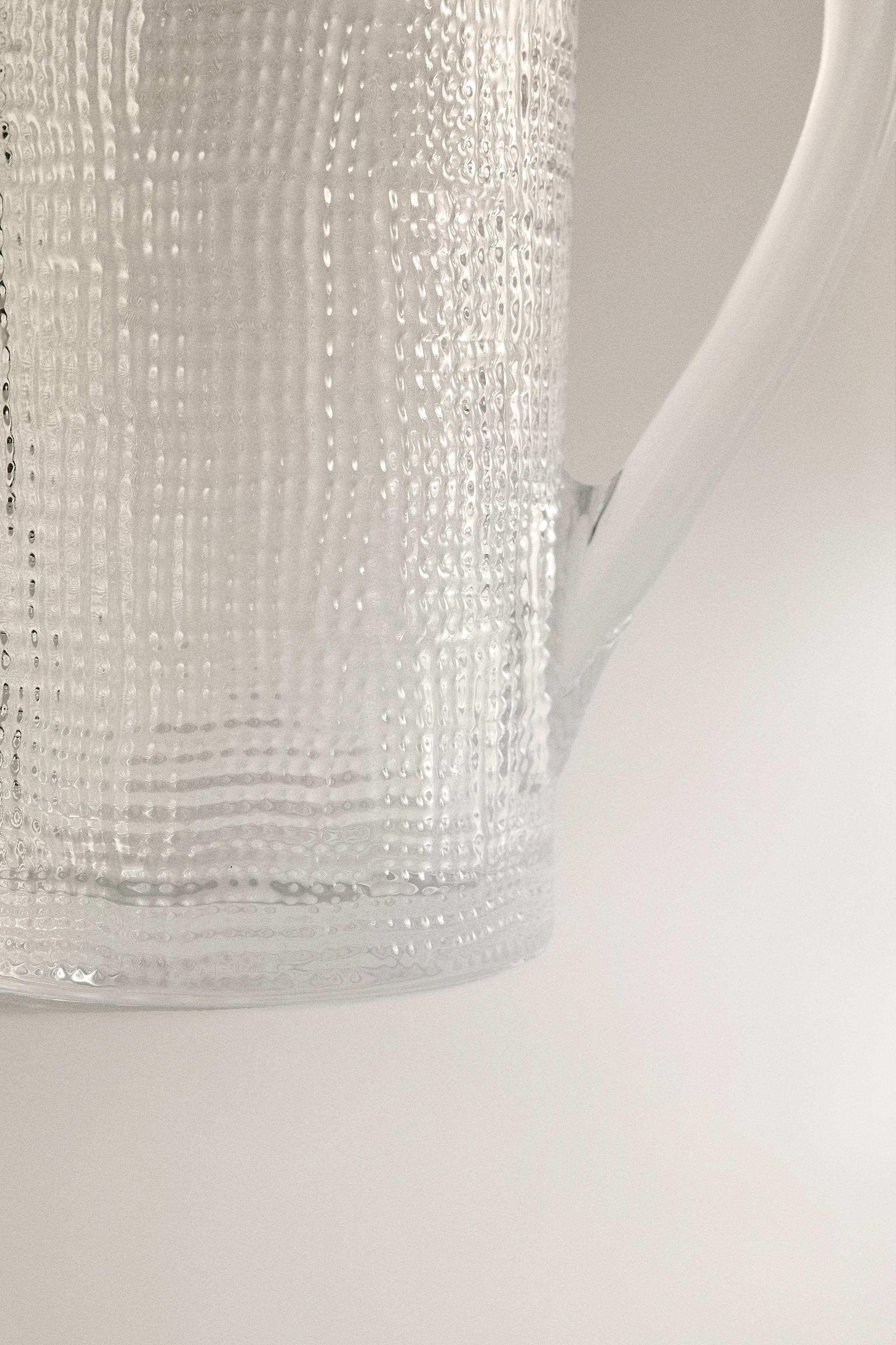 RAISED DESIGN GLASS PITCHER