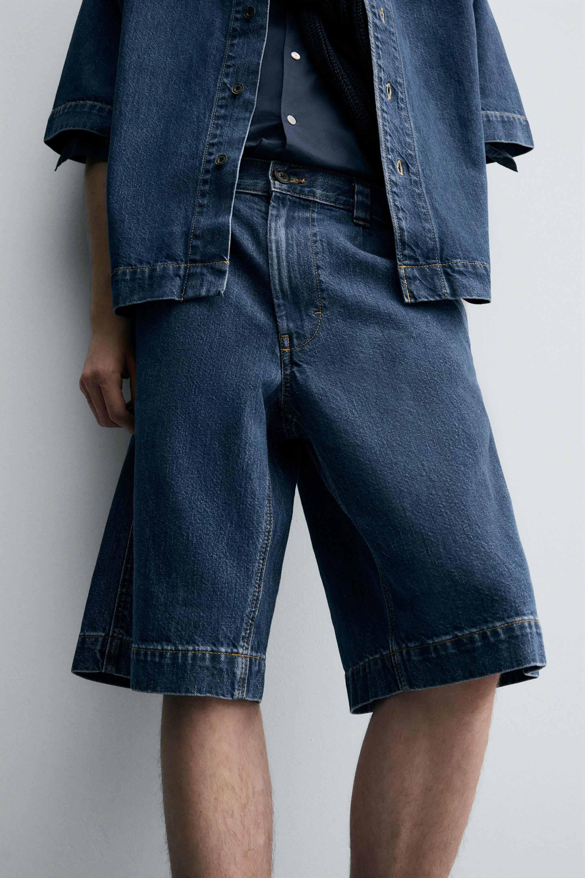 PLEATED RELAXED FIT DENIM SHORTS