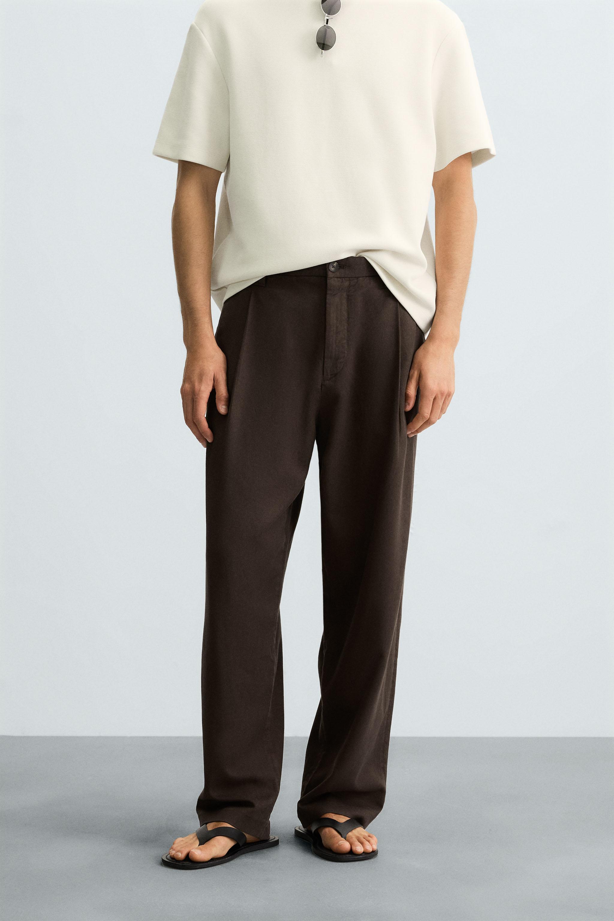 FLOWY PLEATED PANTS
