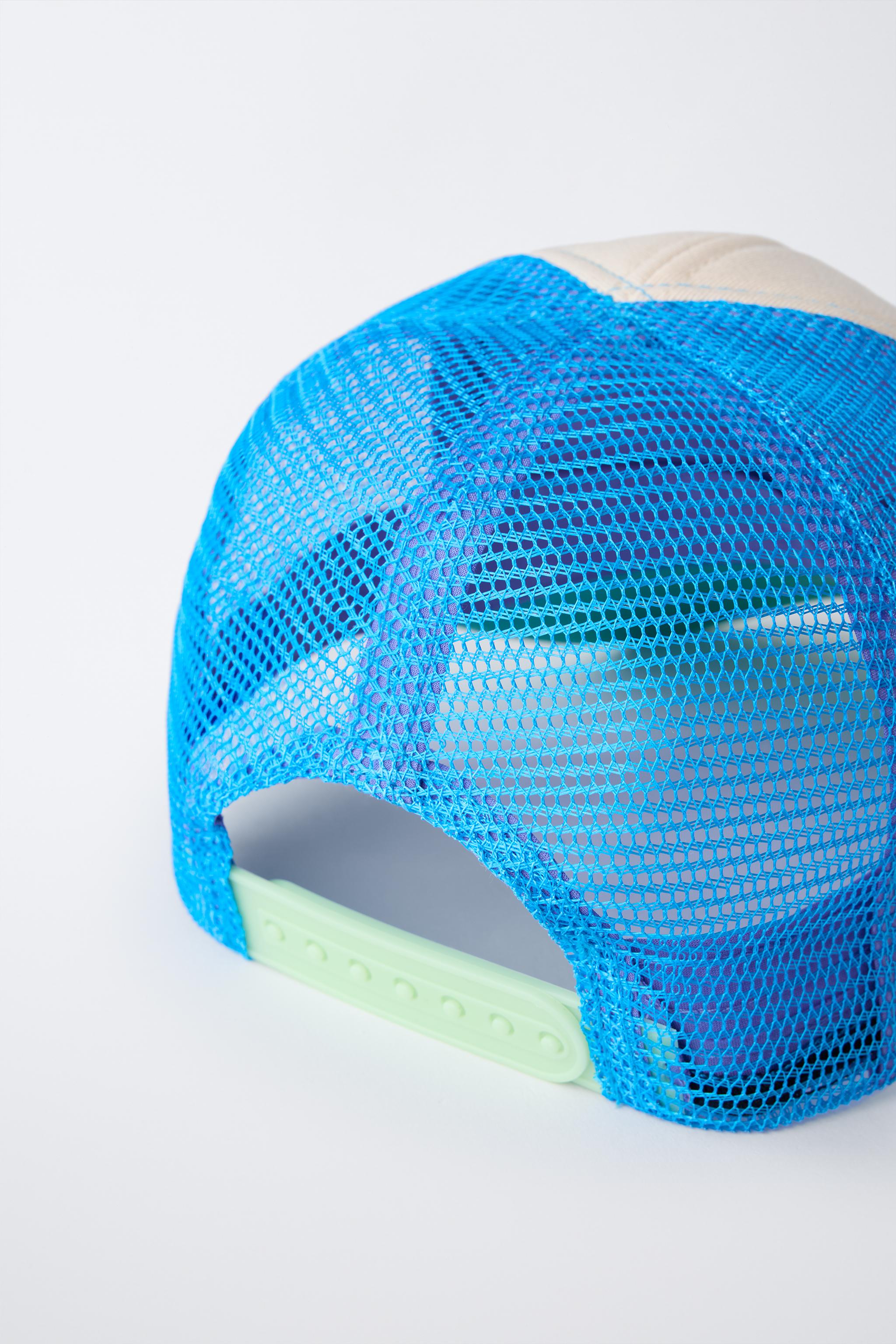 RAISED TEXT TRUCKER HAT