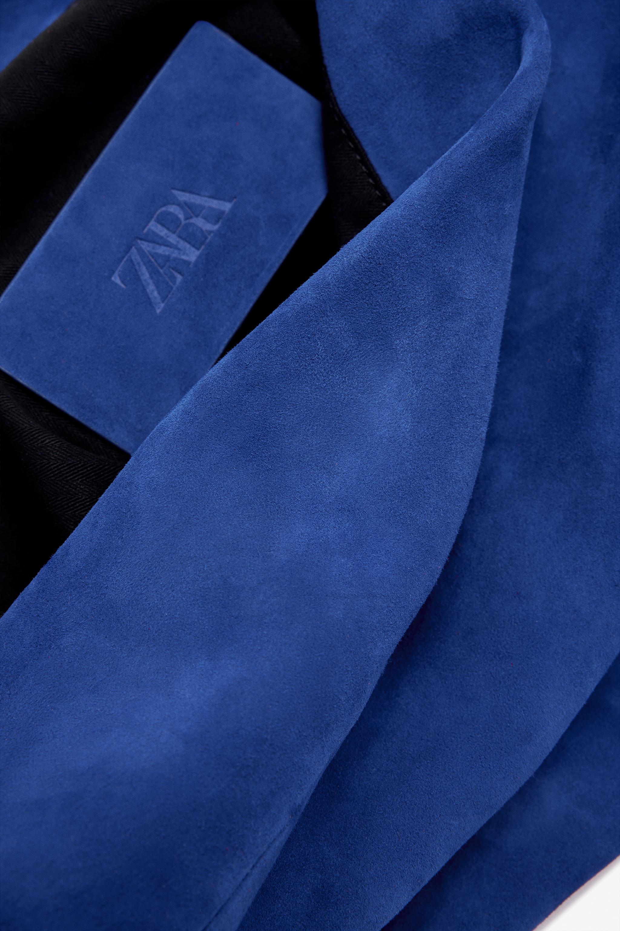 LIMITED EDITION MAXI SUEDE CLUTCH