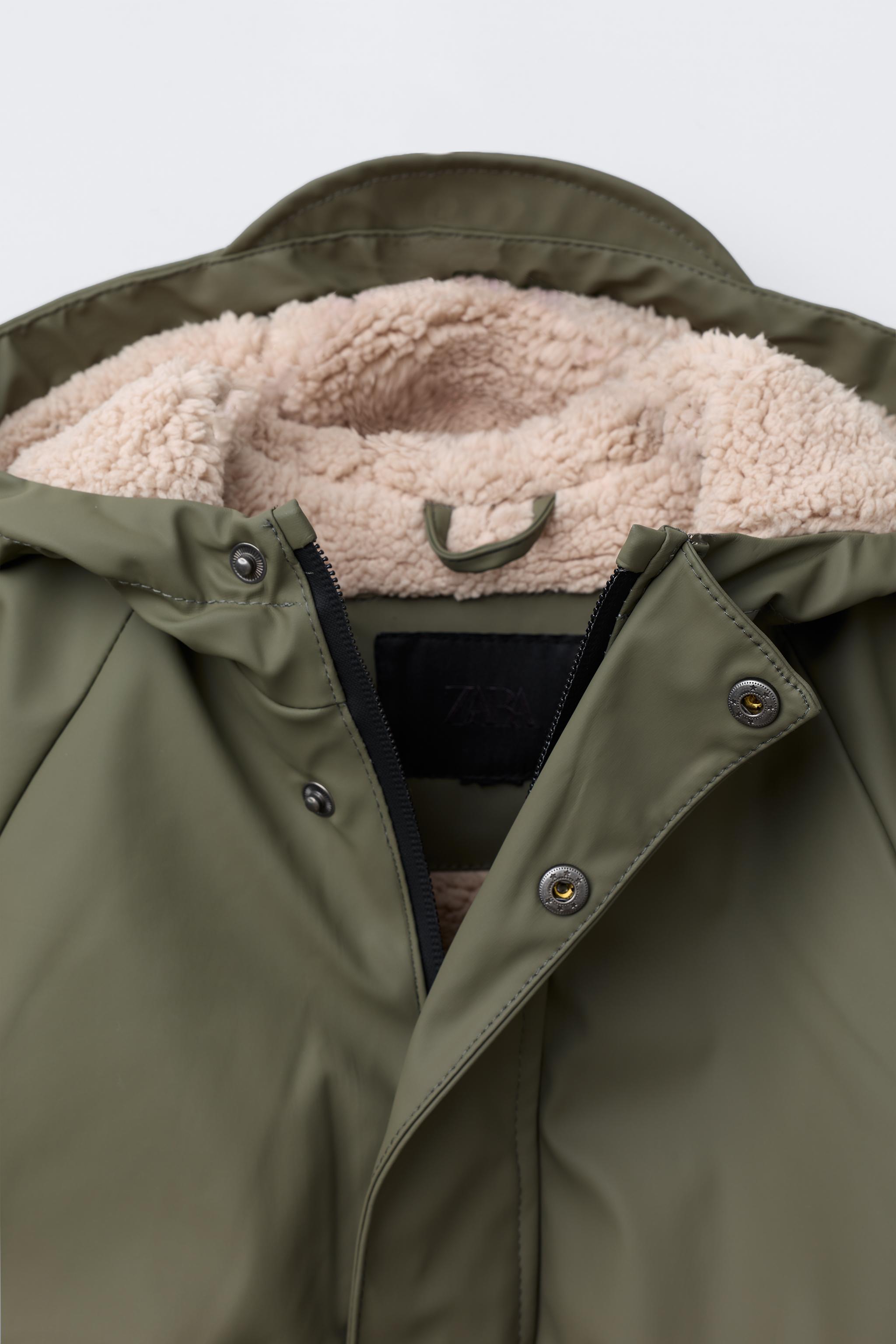 WATER REPELLENT FAUX SHEARLING COATED JACKET