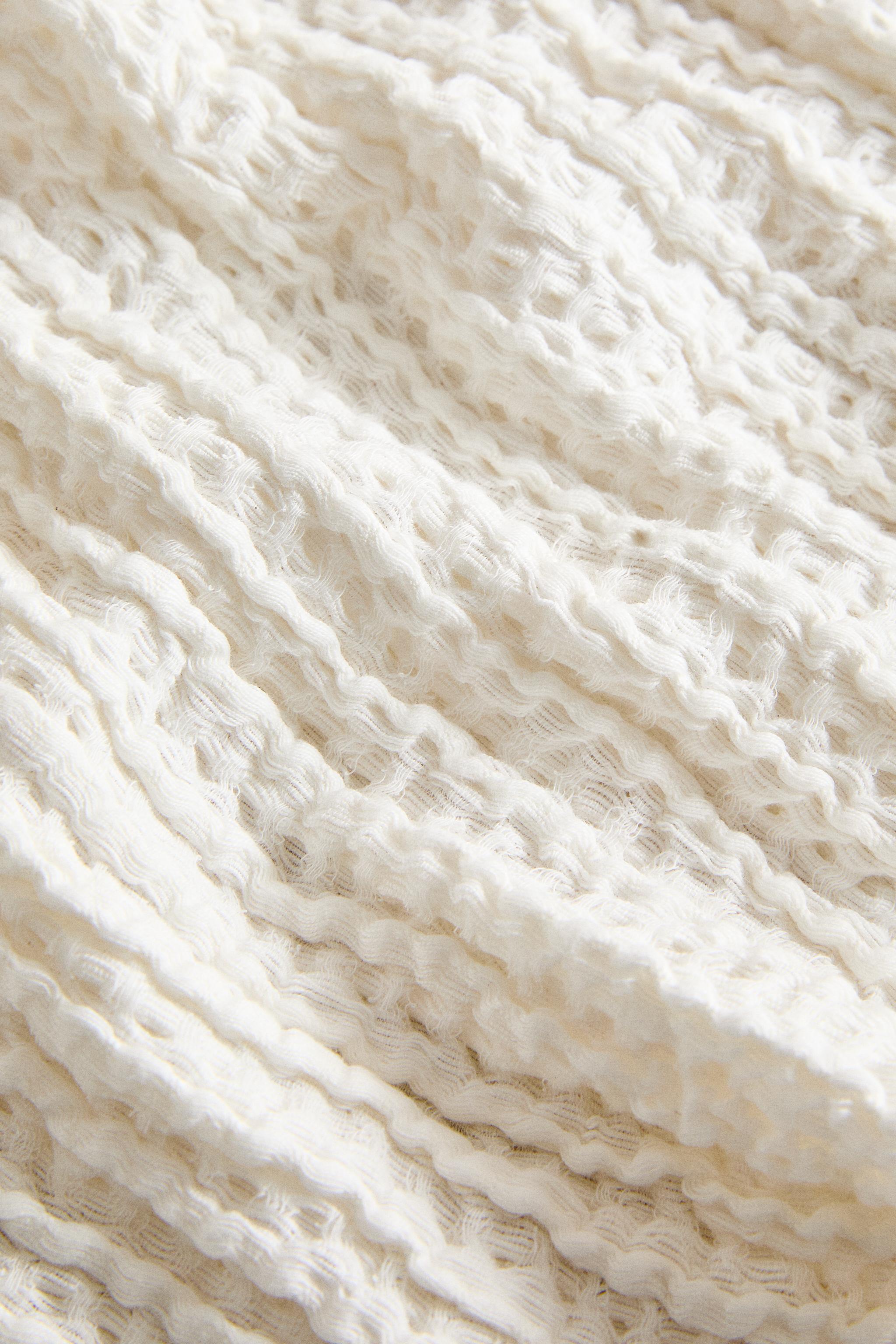 WAFFLE-KNIT BATH TOWEL WITH PLAIN BORDER