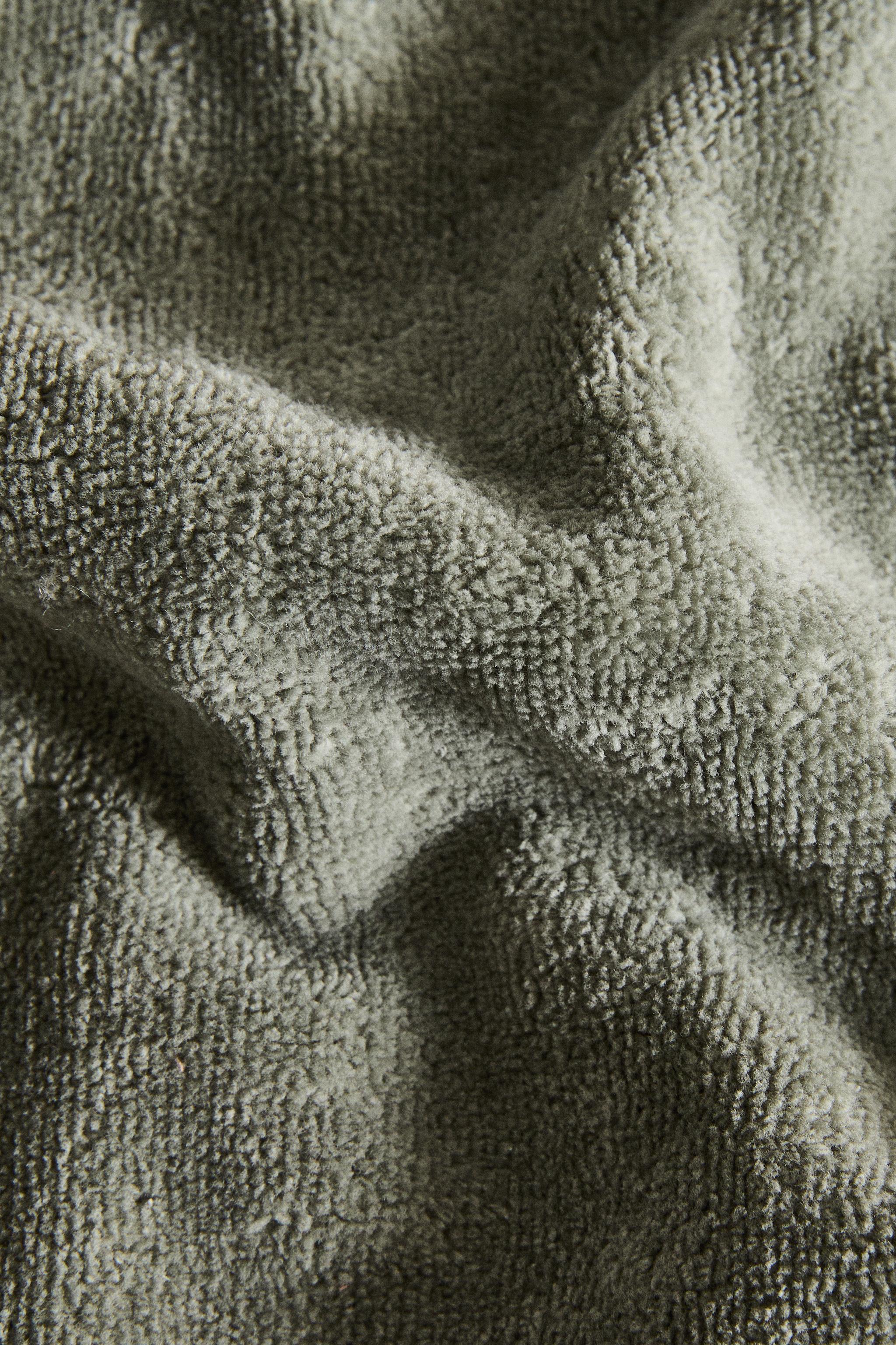 VELOUR OVERLOCK BATH TOWEL