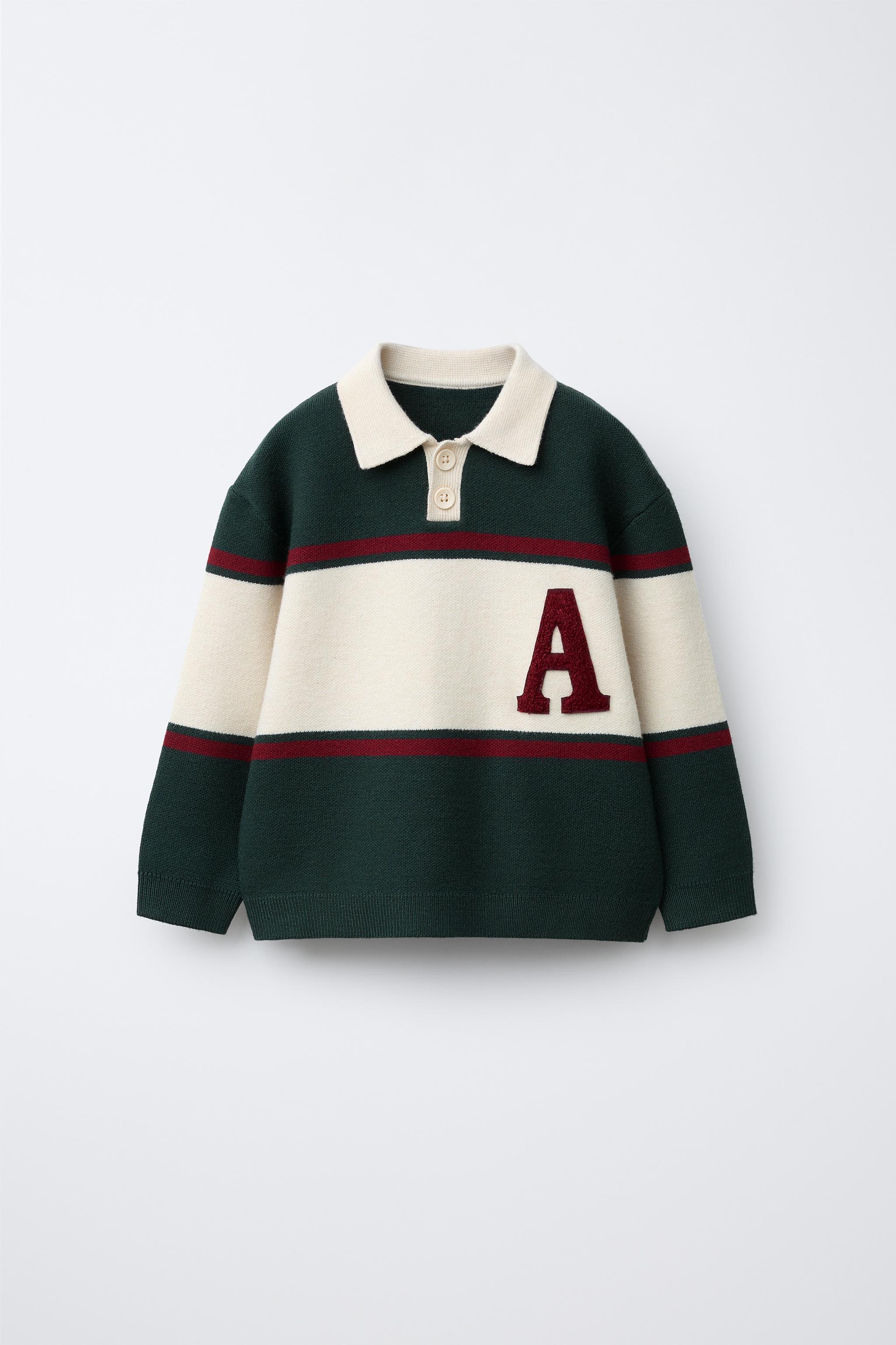 VARSITY KNIT POLO
