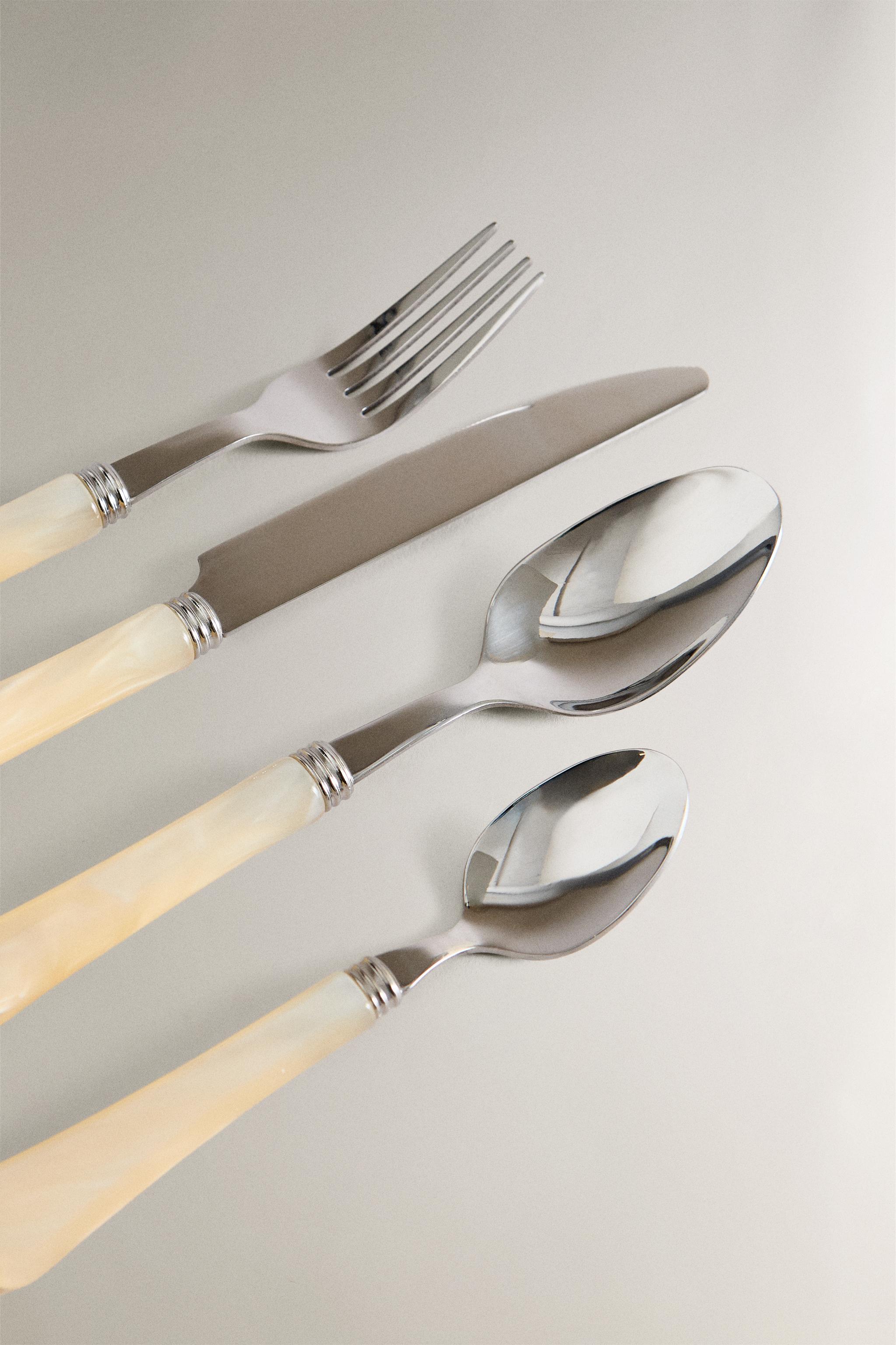 4-PIECE FLATWARE SET WITH PEARL-EFFECT HANDLE