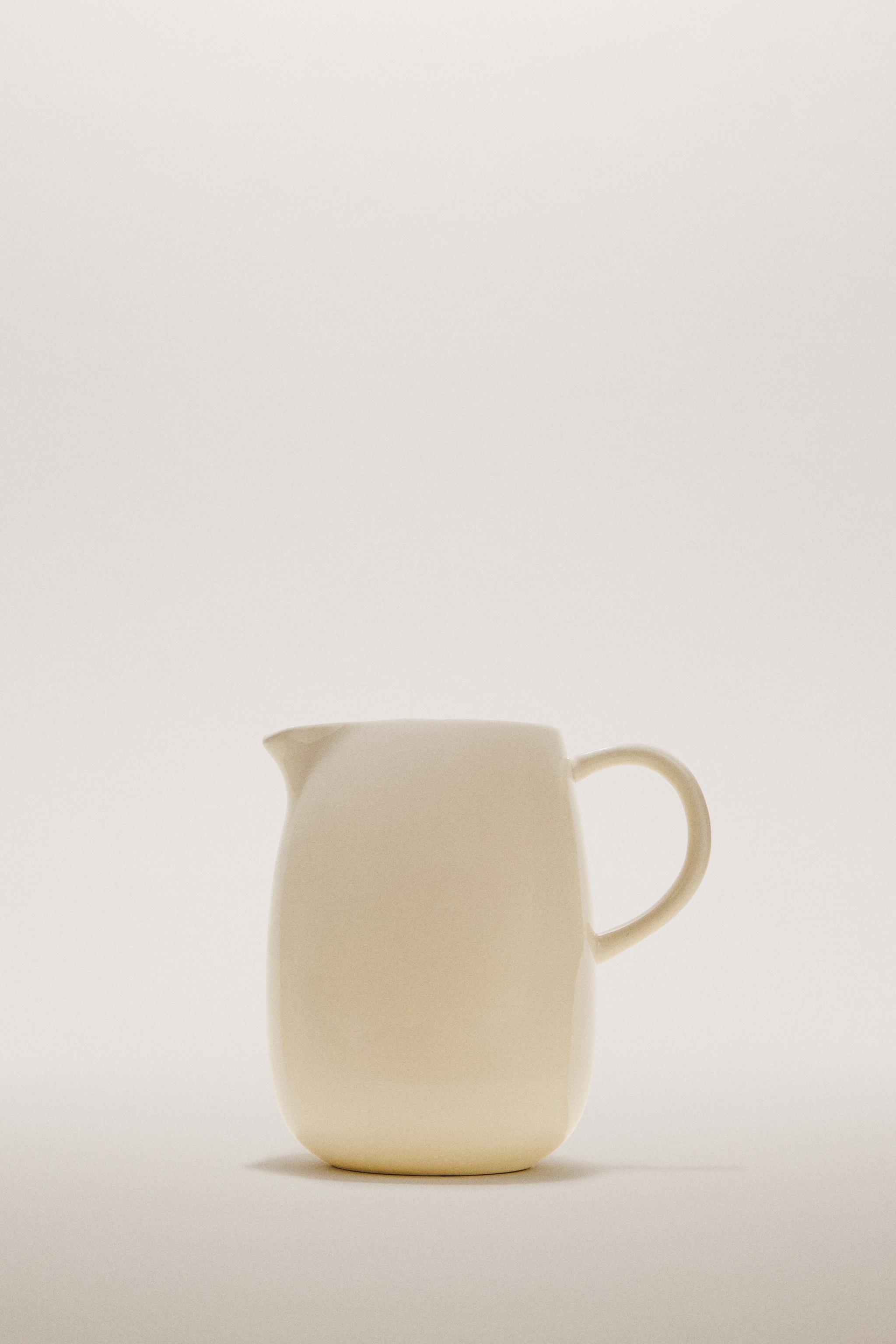 PLAIN STONEWARE MILK PITCHER