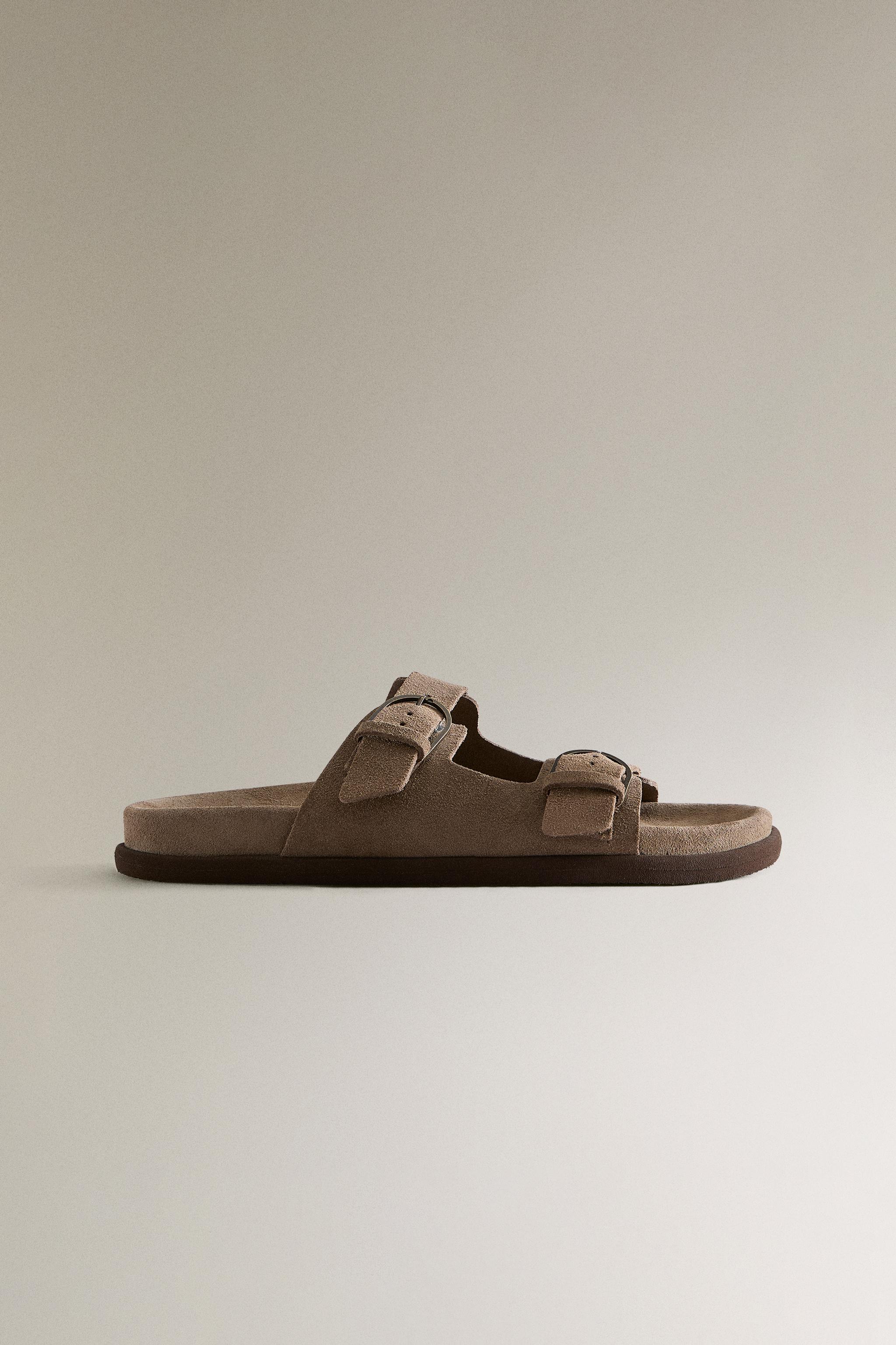 FLAT LEATHER SANDALS WITH BUCKLES
