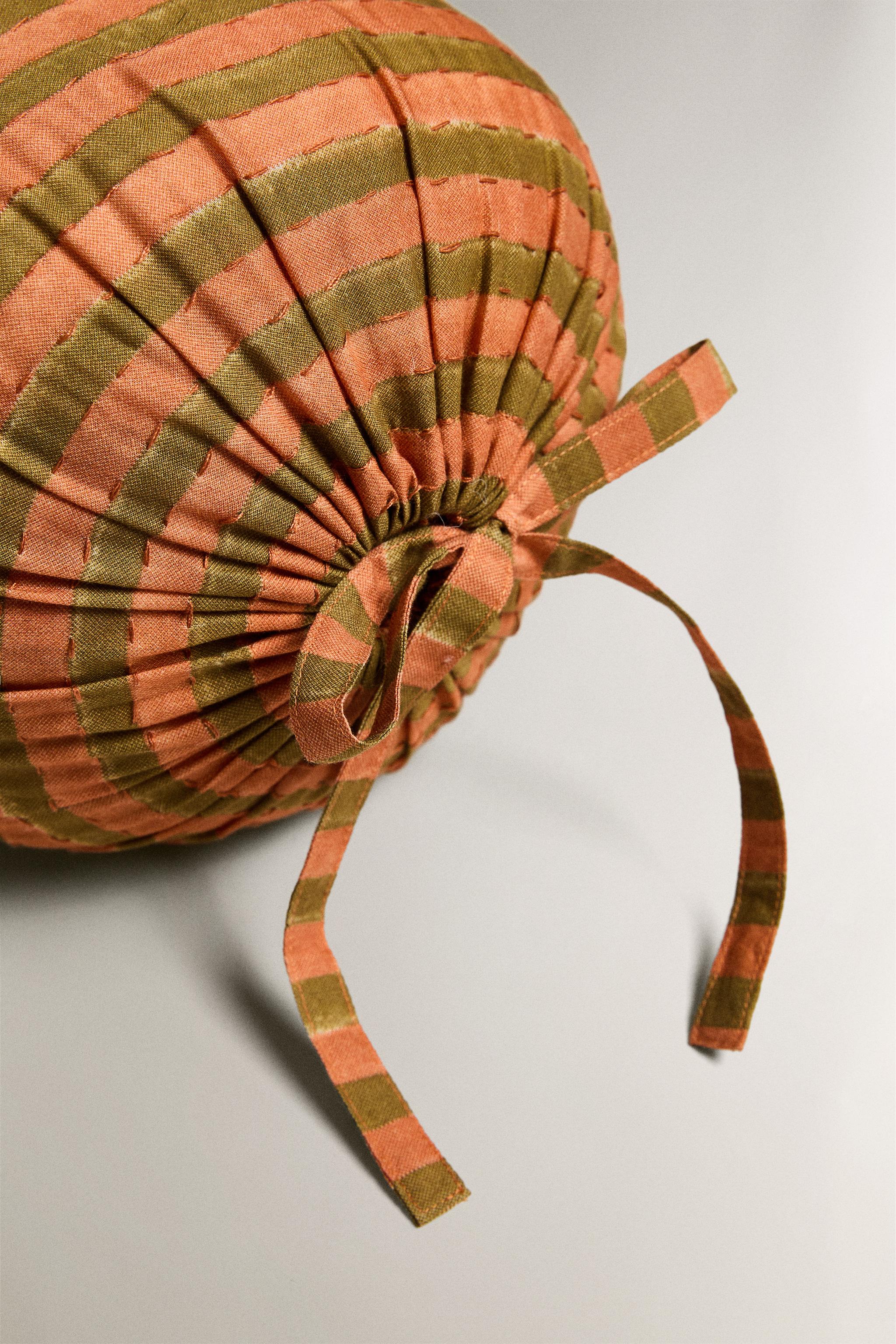 STRIPED CYLINDRICAL CUSHION