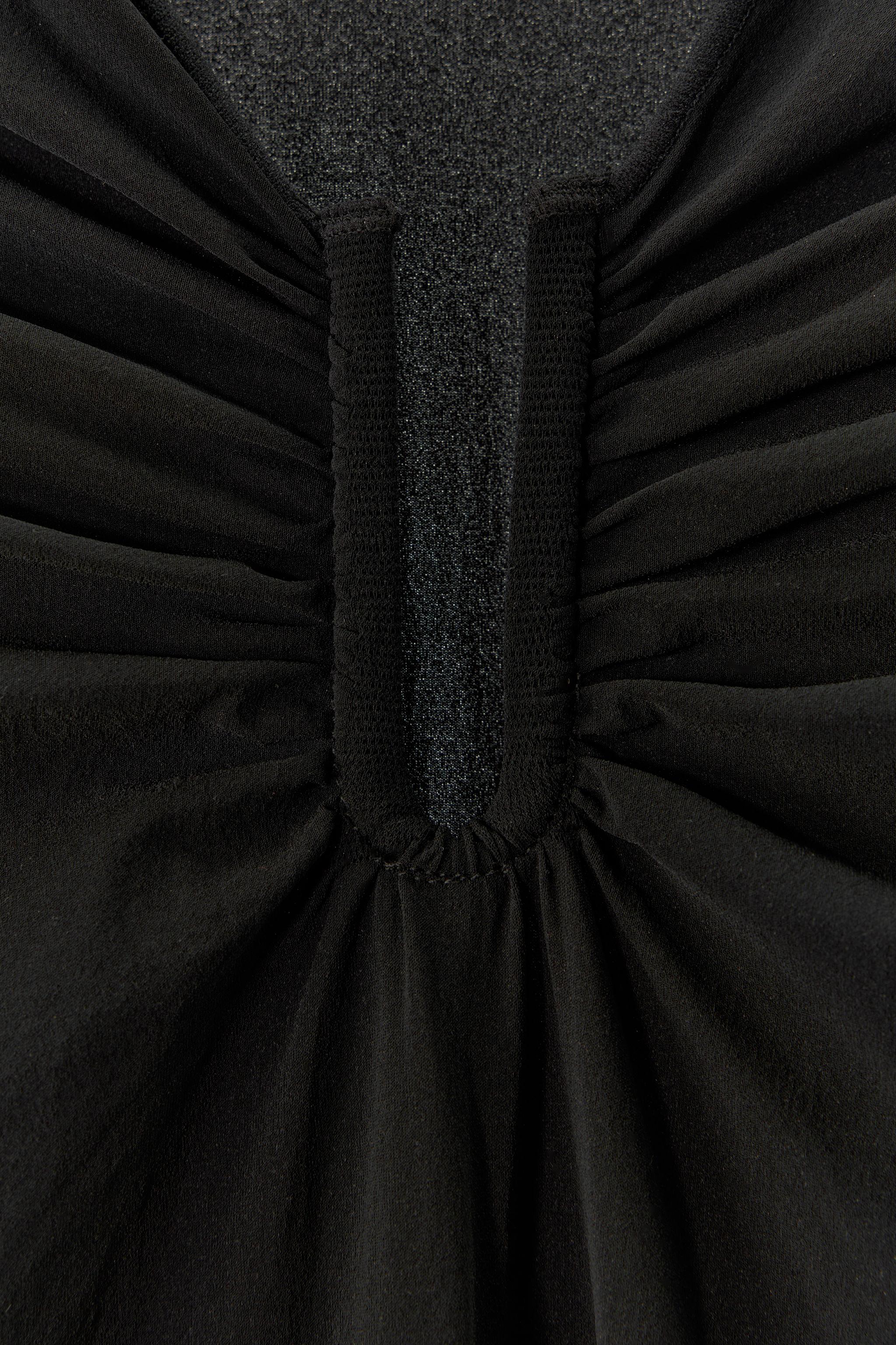 STOCKING BODYSUIT WITH METAL APPLIQUÉ