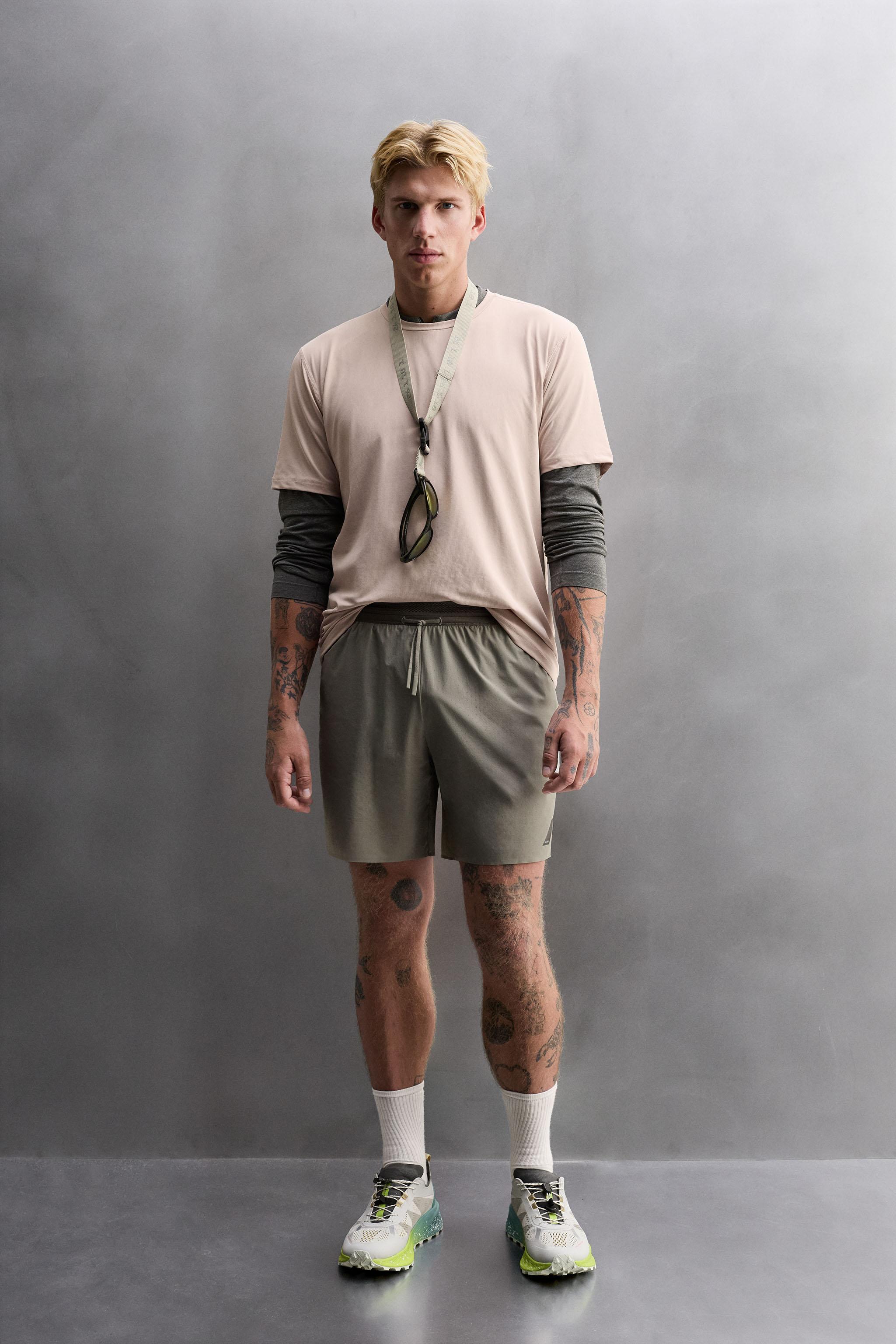 LIGHTWEIGHT PERFORATED SHORTS