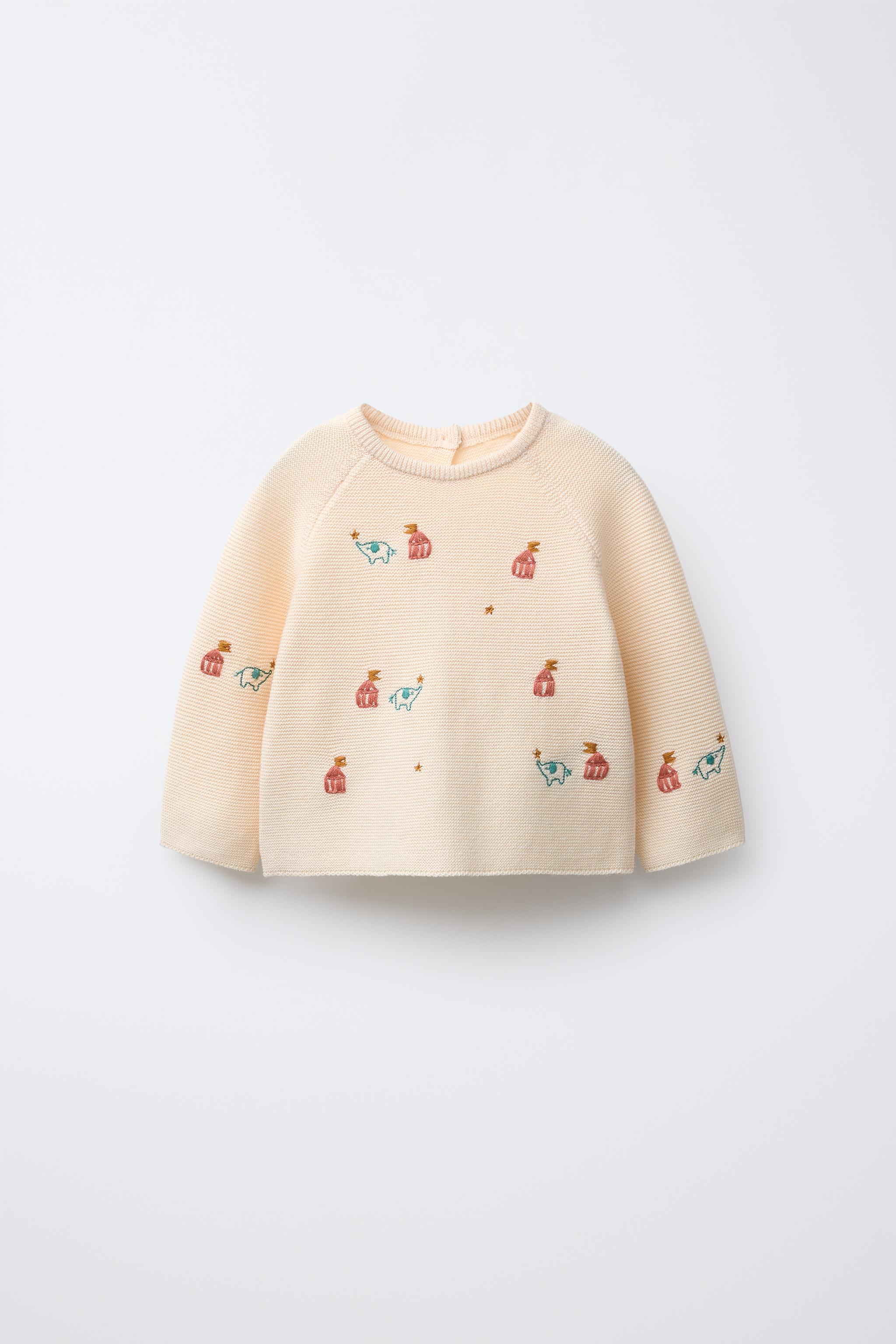 EMBROIDERED ELEPHANT KNIT SWEATER
