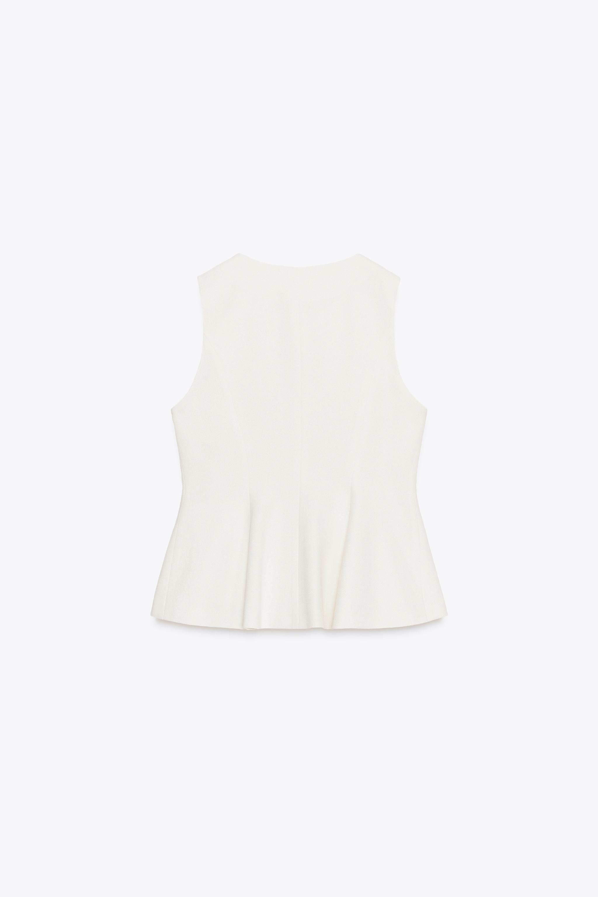 PEPLUM VEST