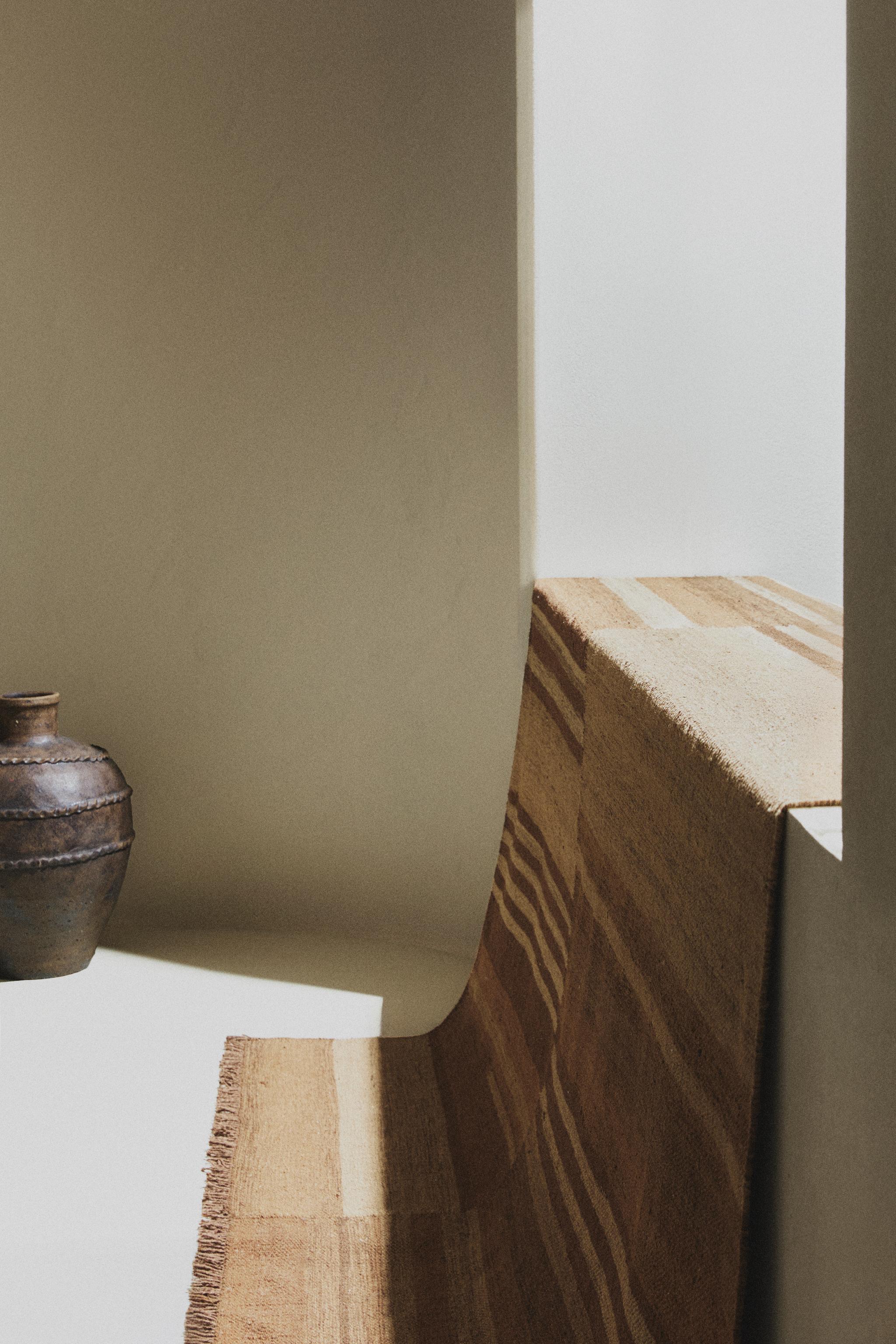 STRIPED AREA RUG WITH FRINGING