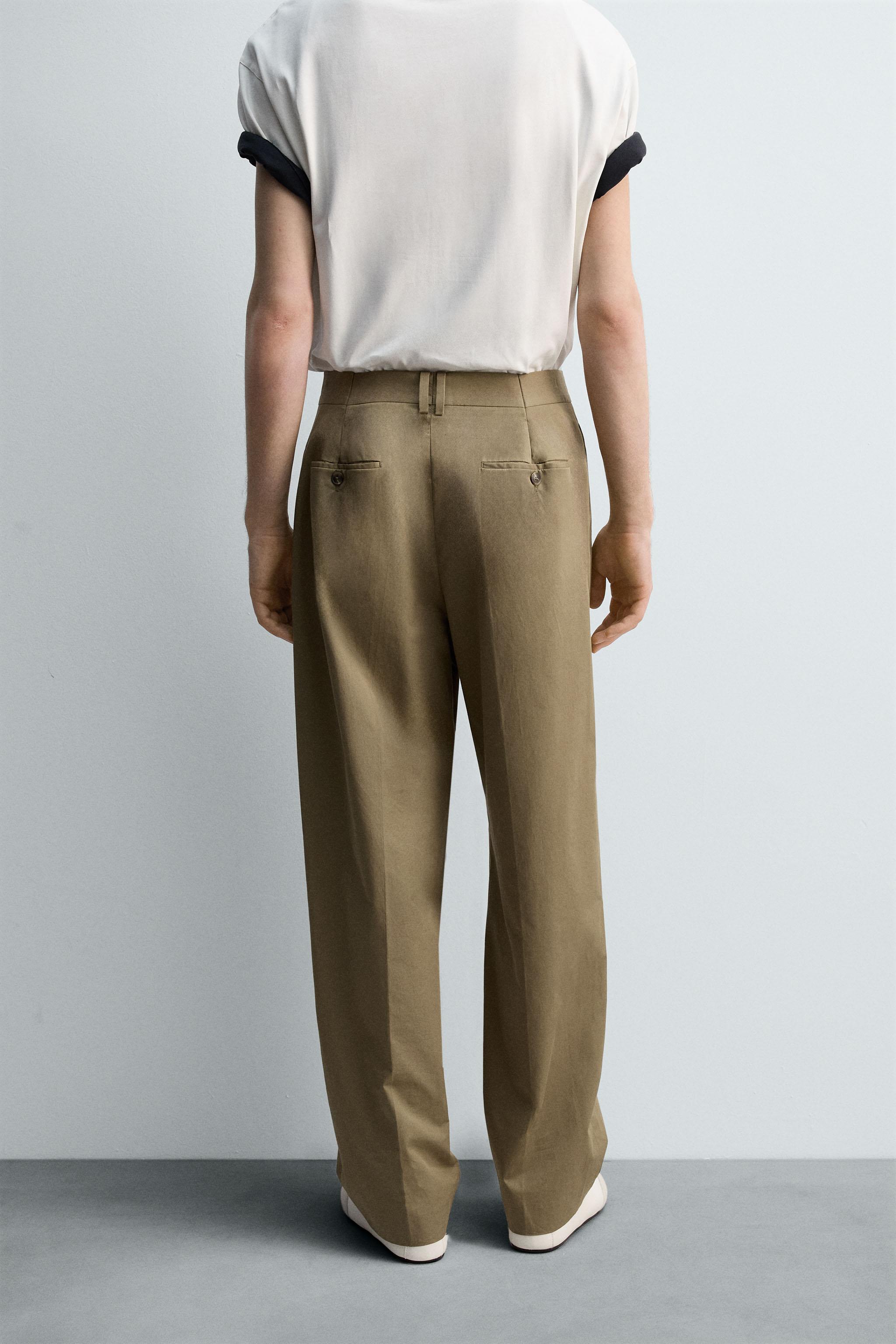 LIMITED EDITION RELAXED FIT PLEATED PANTS