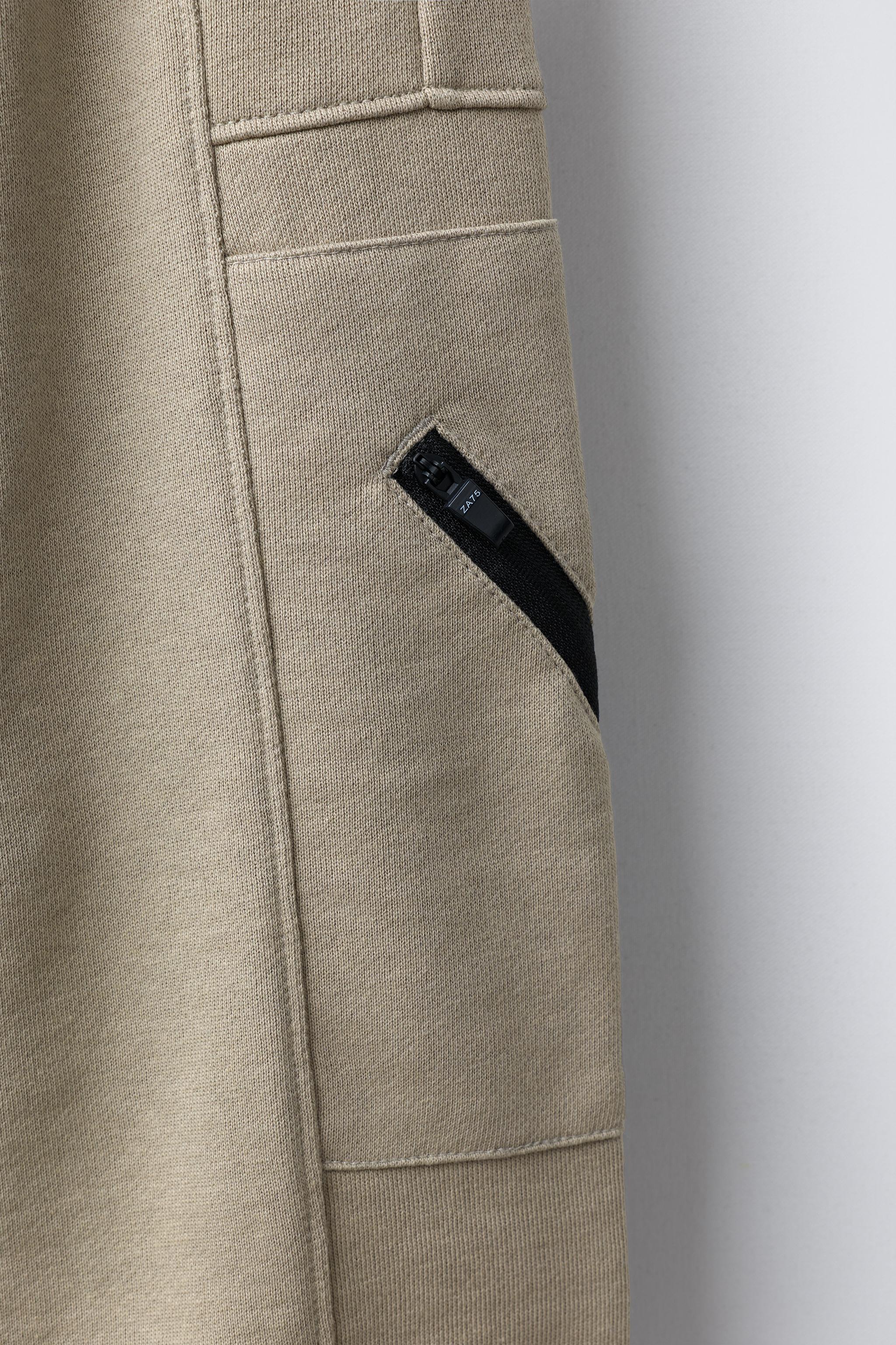 JOGGING PANTS WITH ZIPPERS