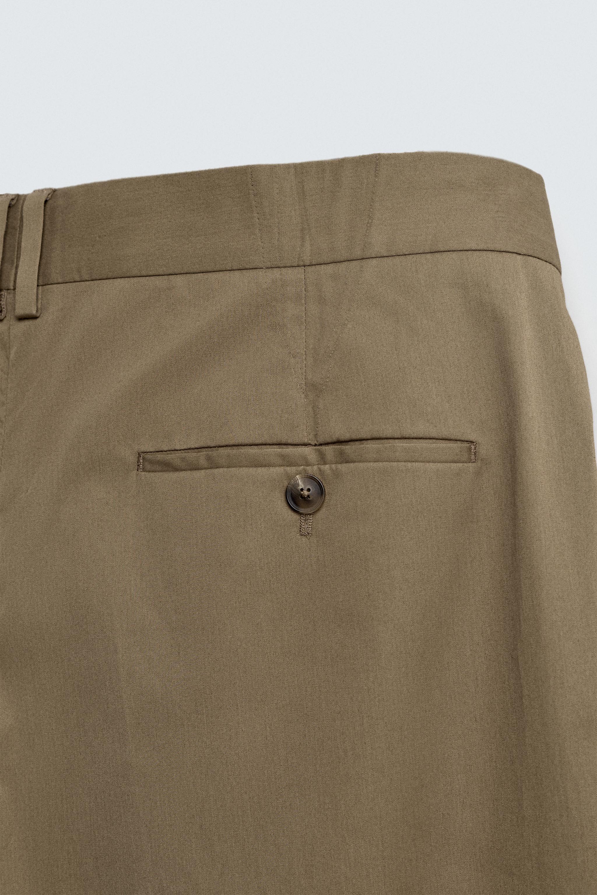 LIMITED EDITION RELAXED FIT PLEATED PANTS