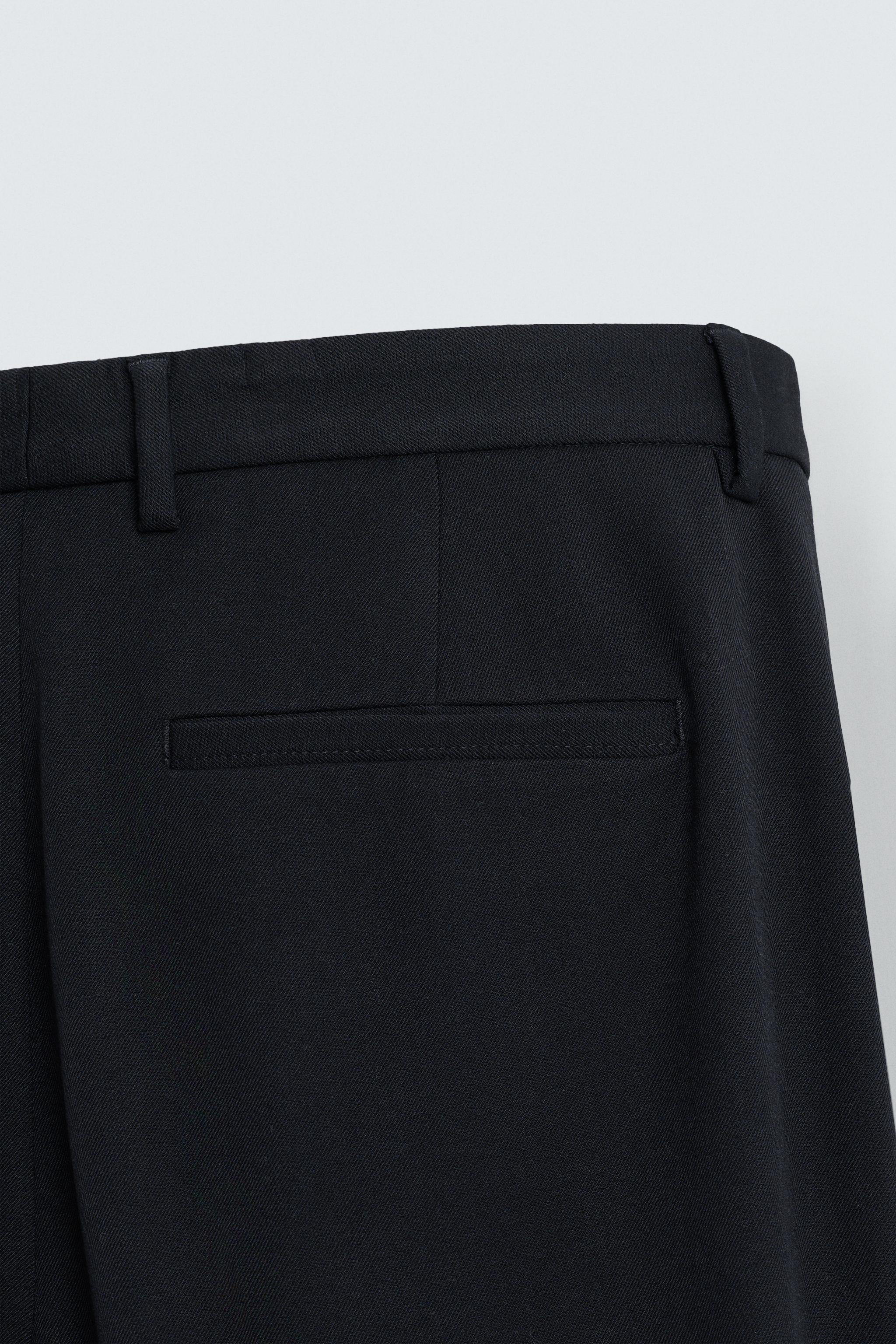 REGULAR FIT PLEATED PANTS