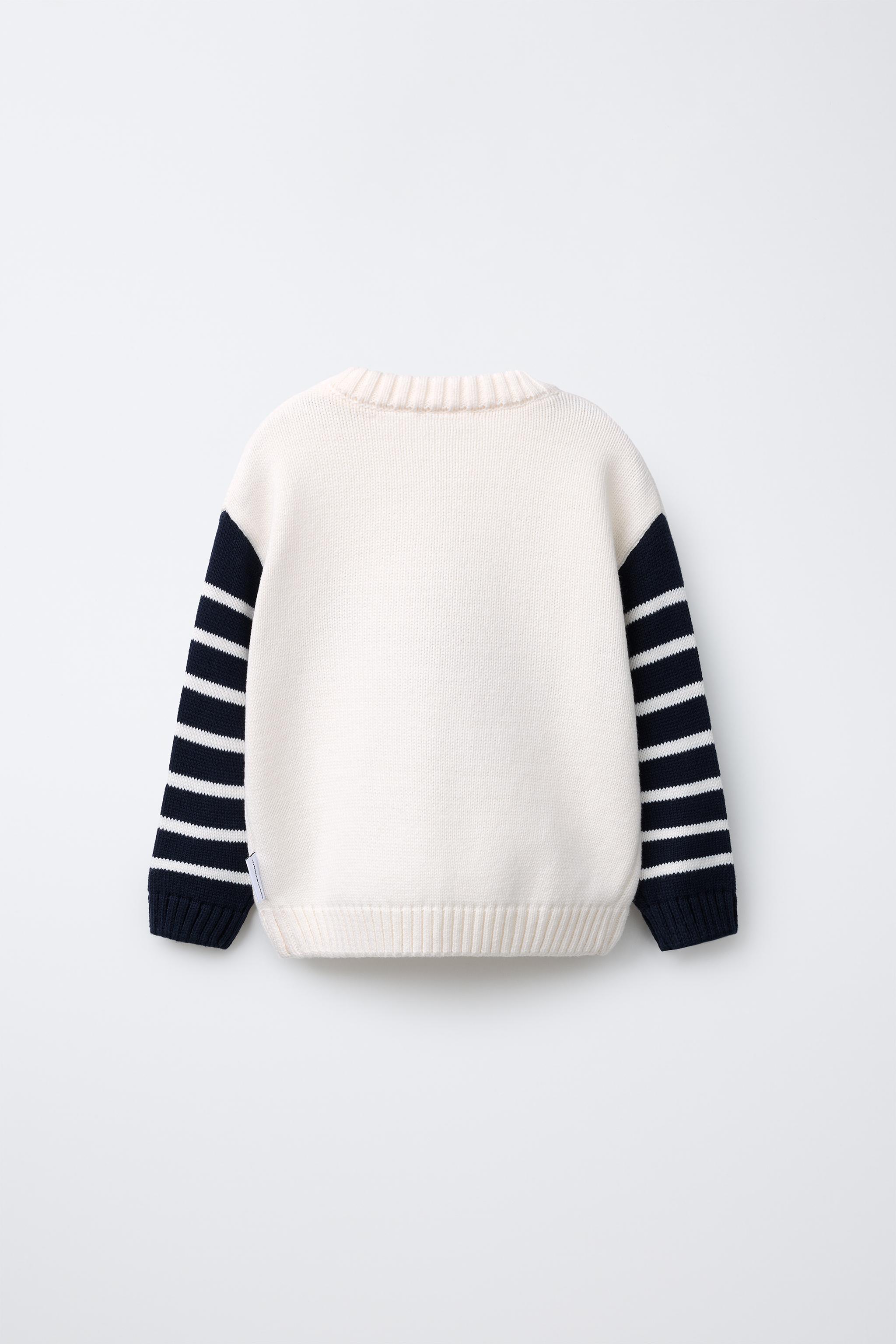 SNOOPY PEANUTS™ KNIT SWEATER