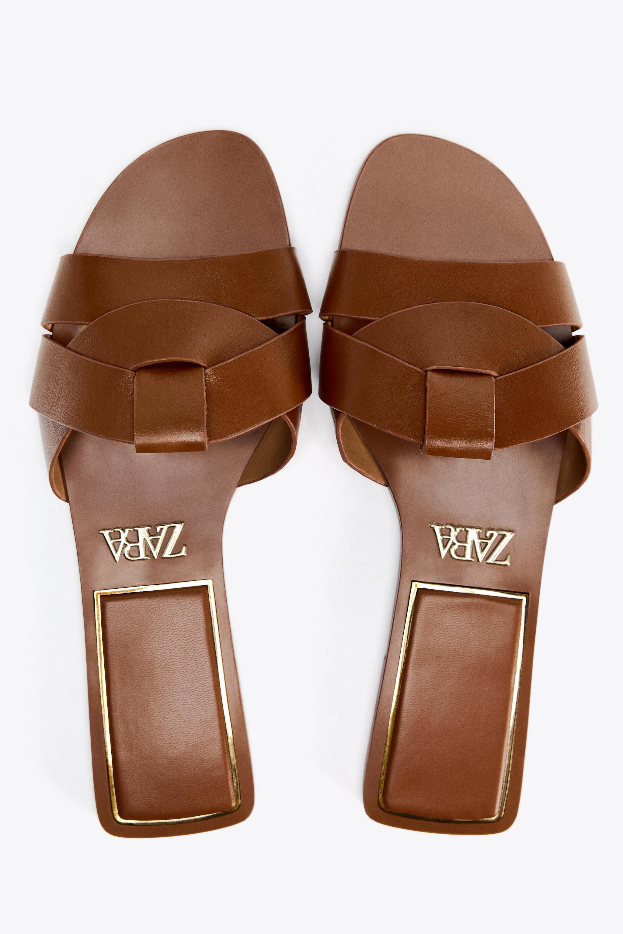 FLAT CROSSED LEATHER SANDALS