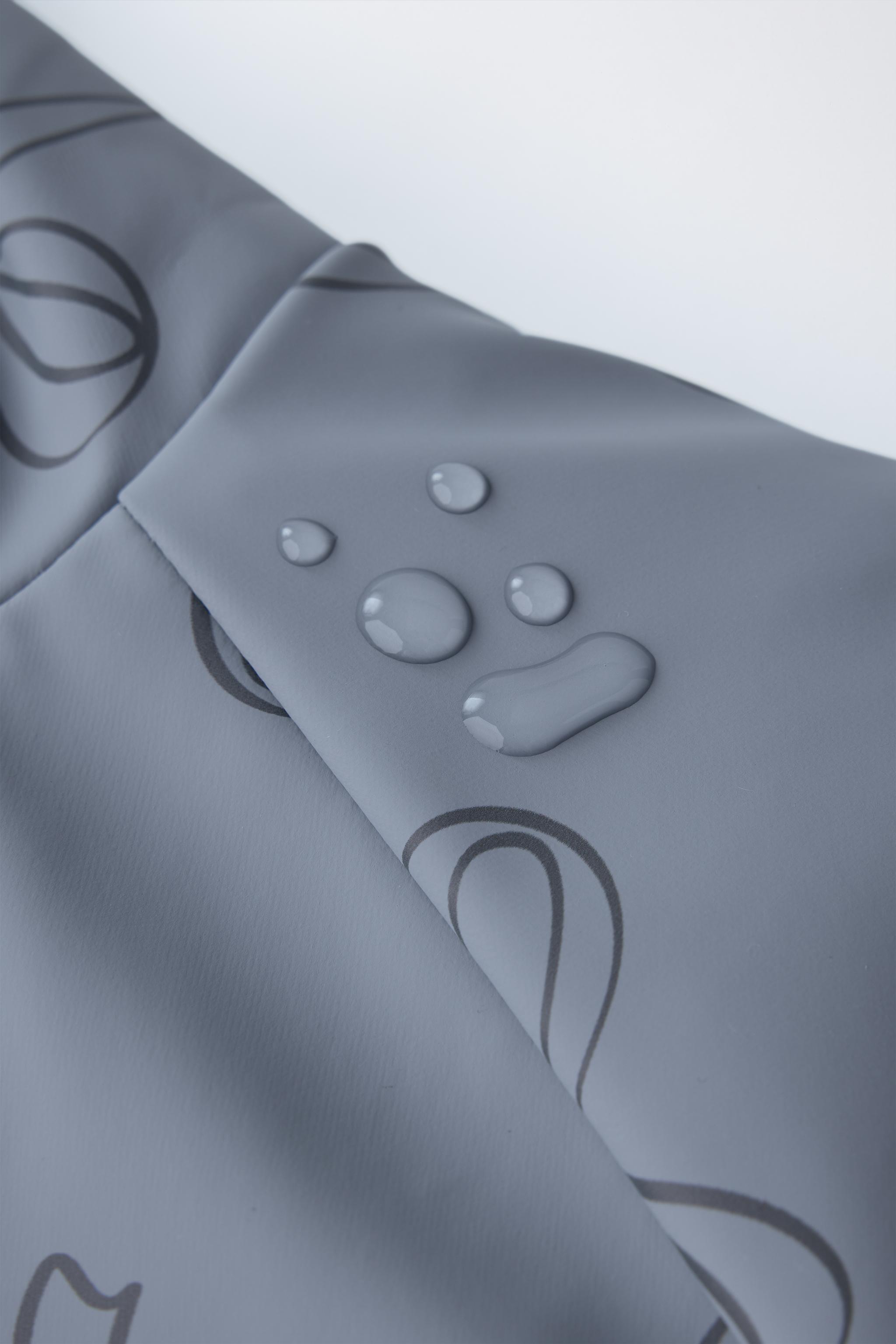 WATER RESISTANT PRINTED RUBBERIZED RAINCOAT