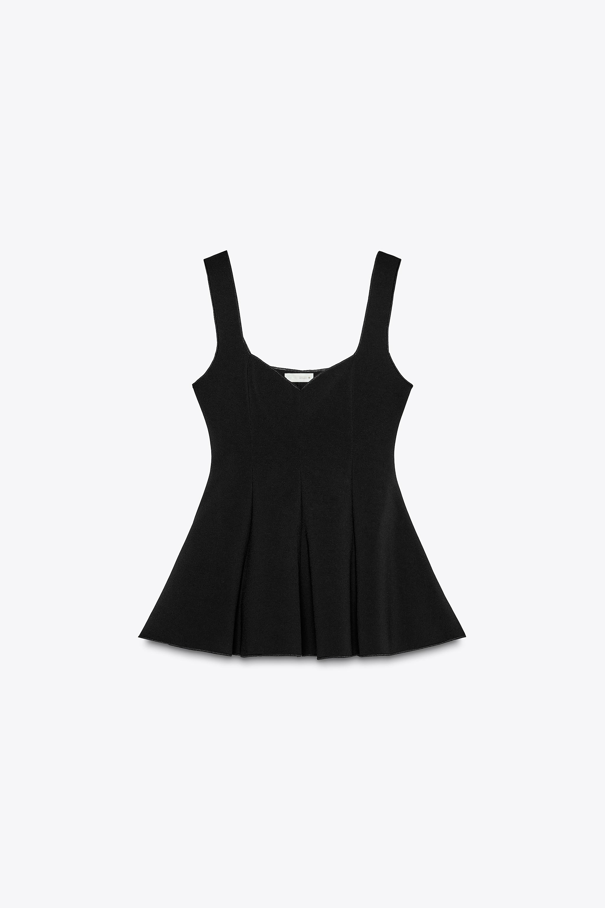 PEPLUM STRETCH TOP