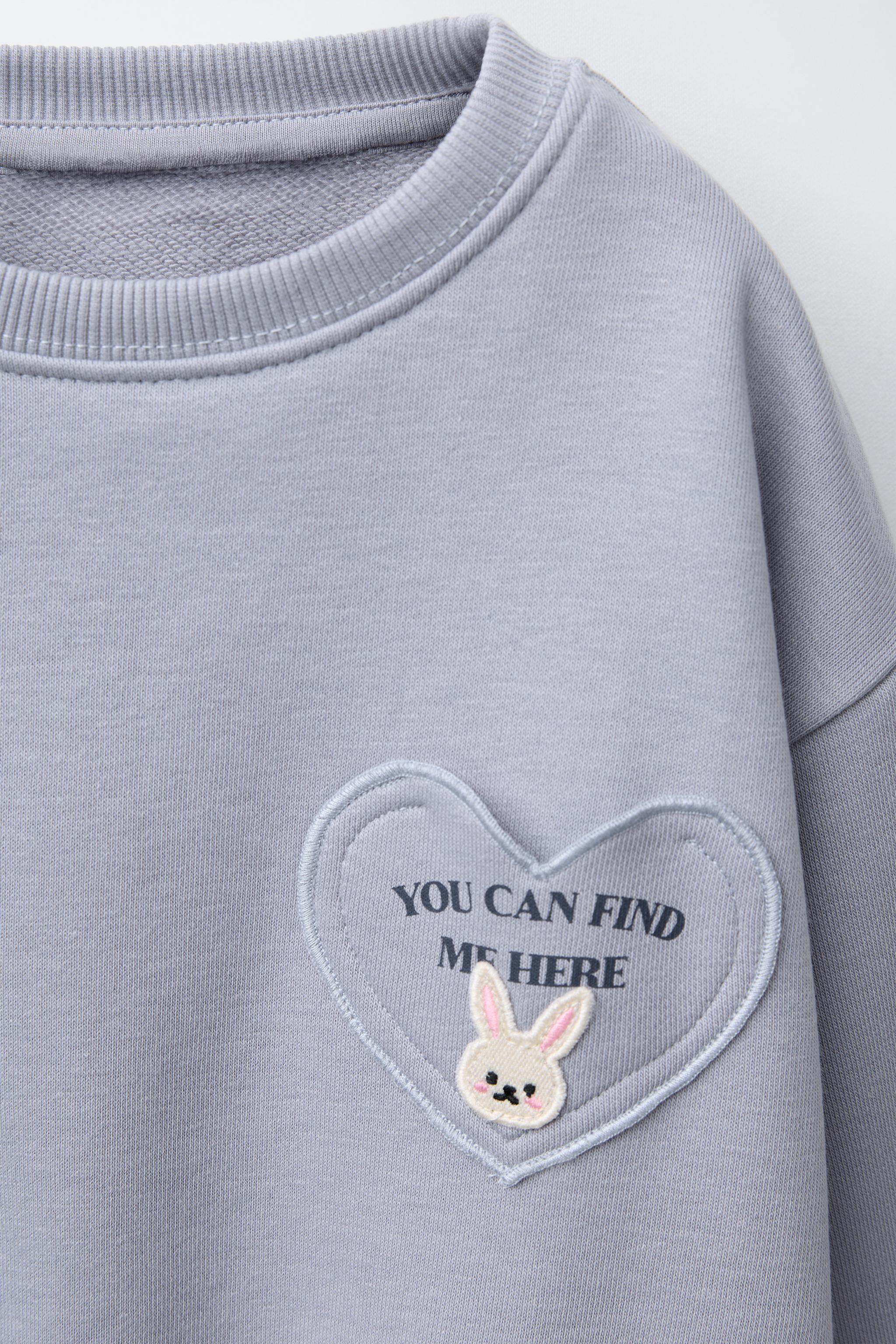 HEART POCKET SWEATSHIRT