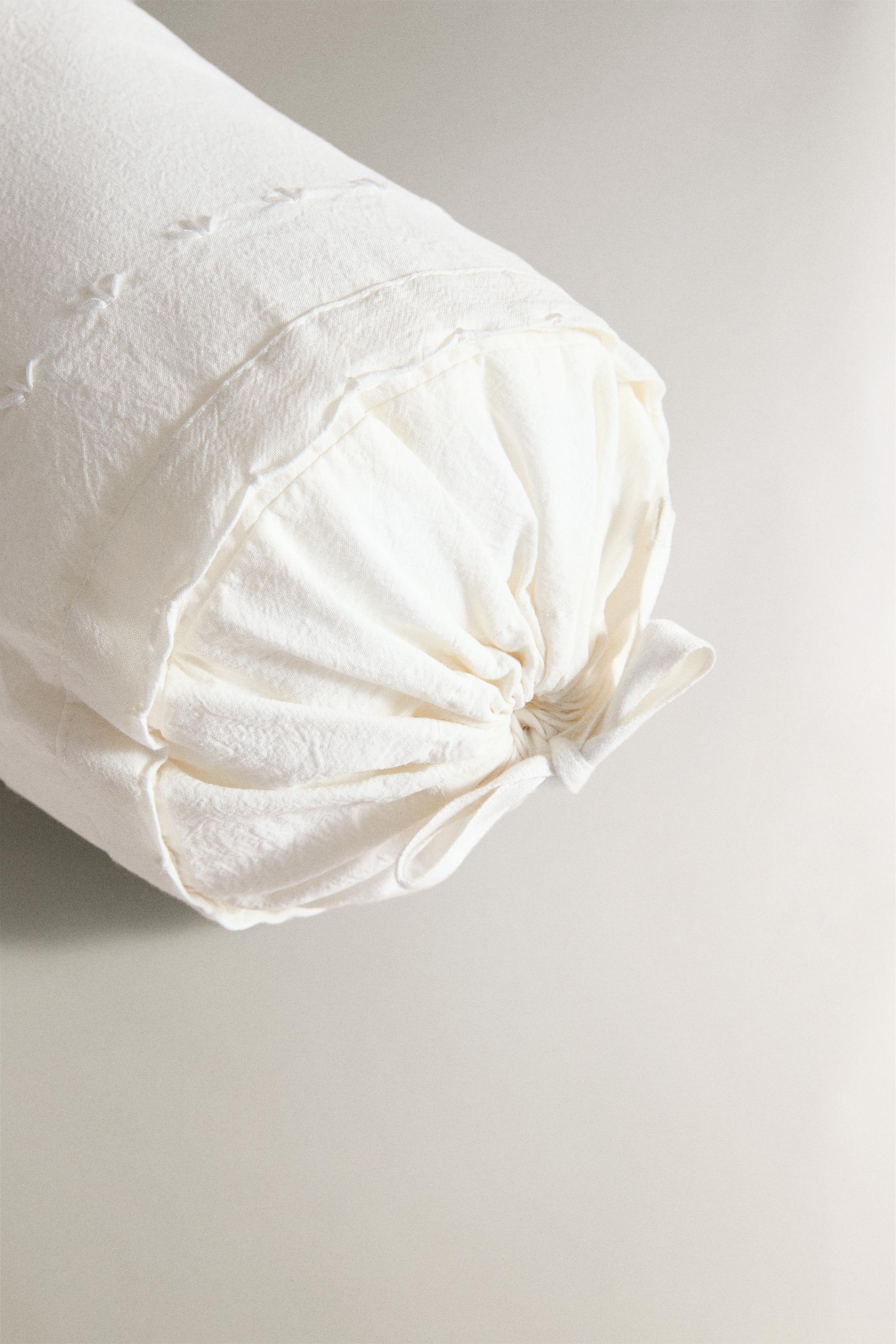 CHILDREN'S BOLSTER CUSHION WITH EMBROIDERED DESIGN