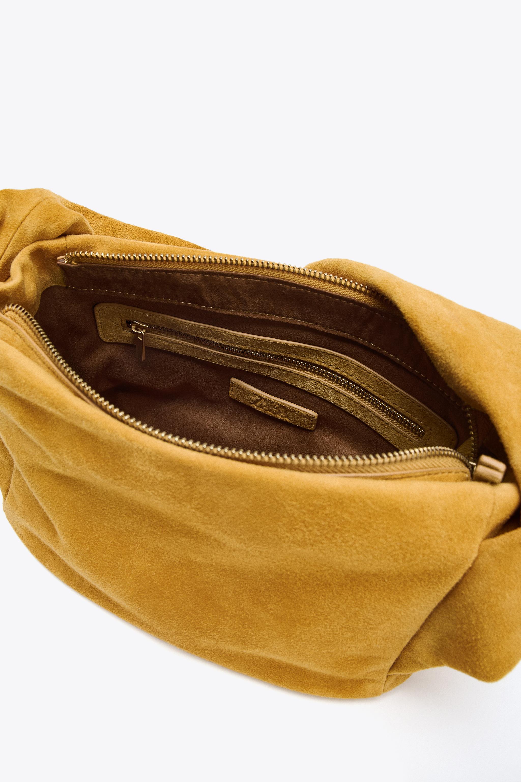 SPLIT LEATHER HANDBAG