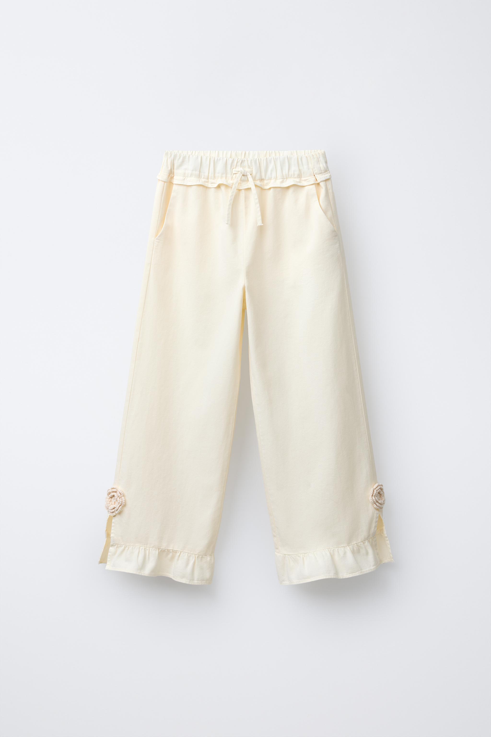 WIDE LEG PANTS WITH CROCHET FLOWER RUFFLES