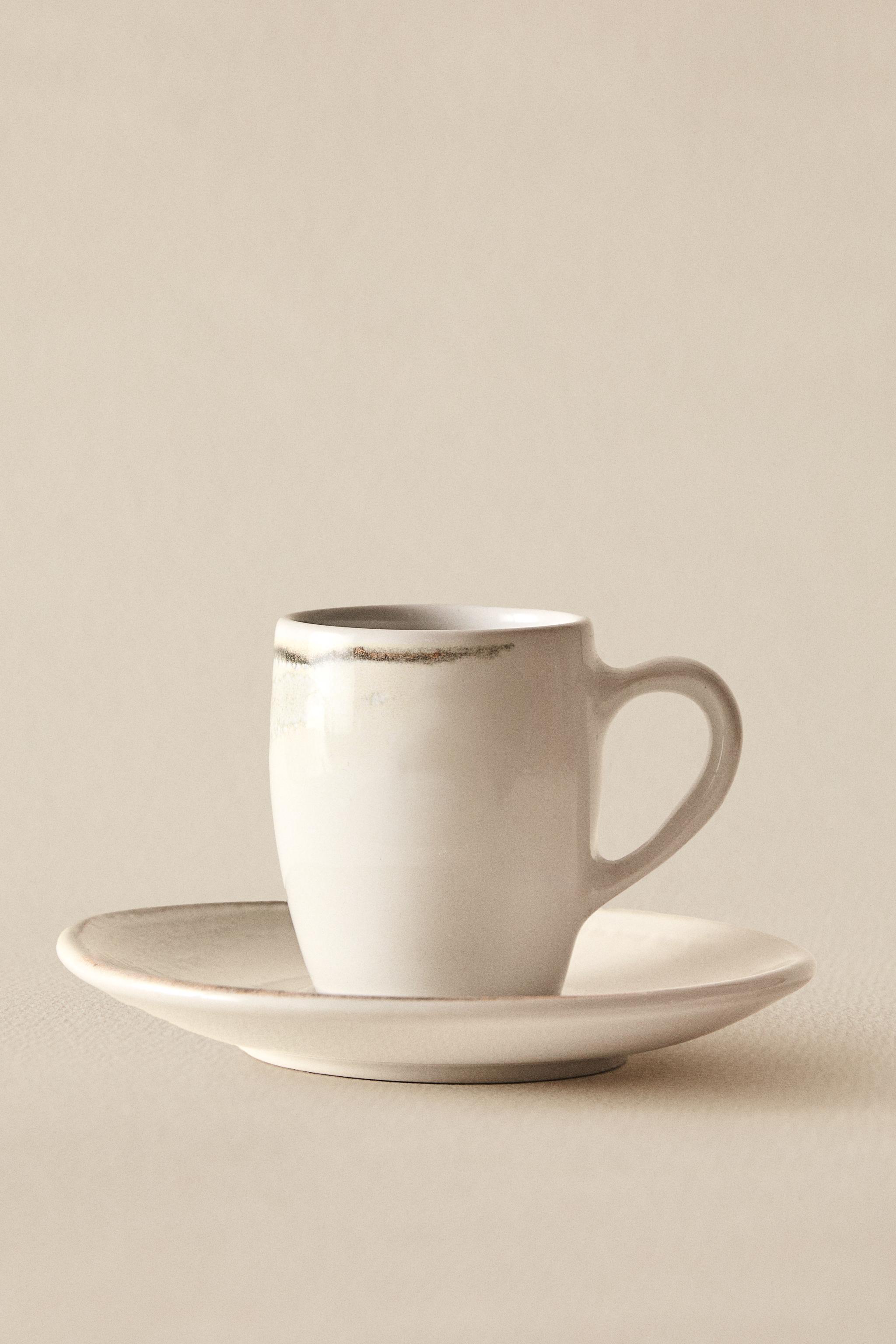STONEWARE COFFEE CUP AND SAUCER