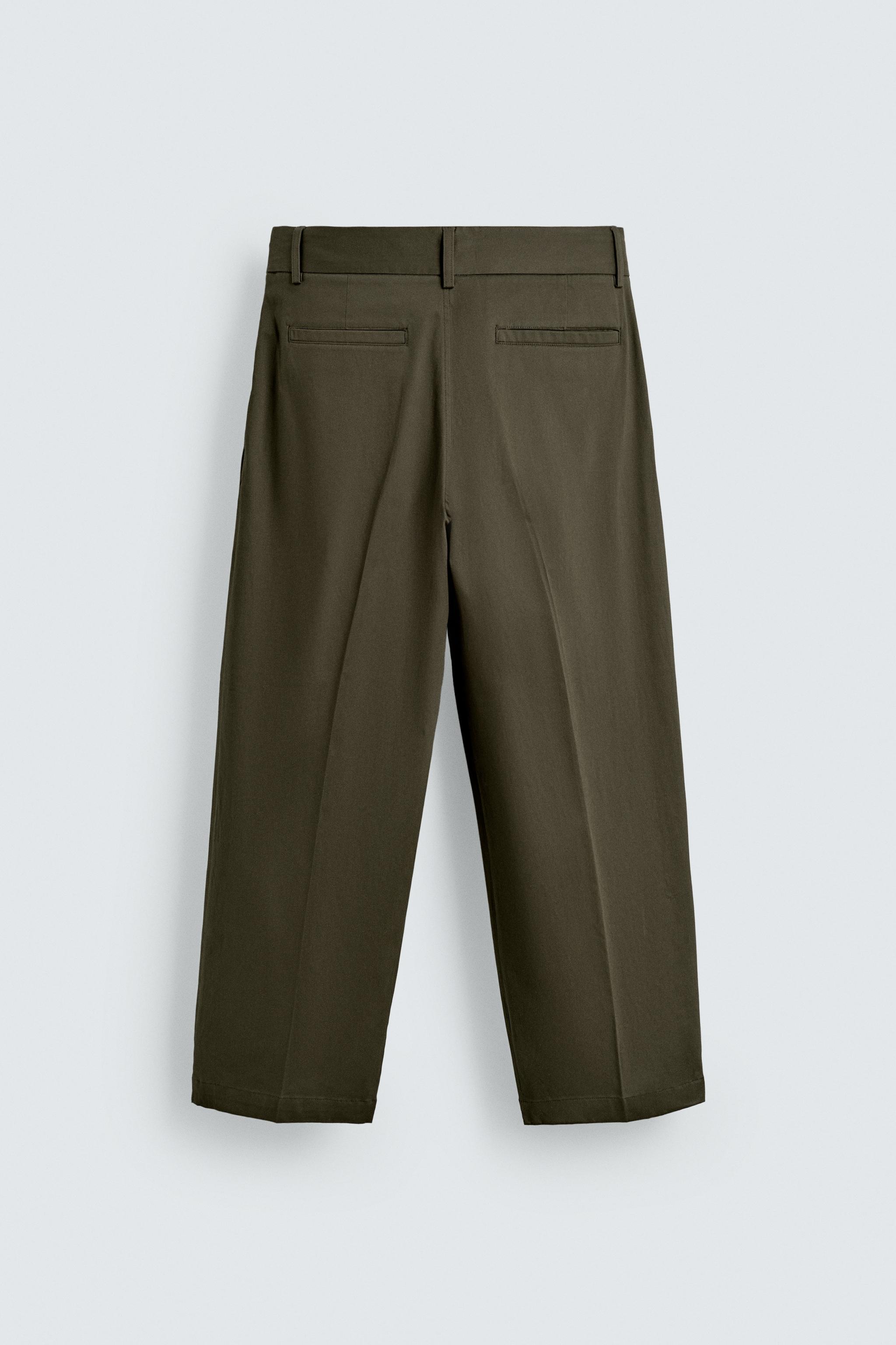 RELAXED FIT PLEATED PANTS